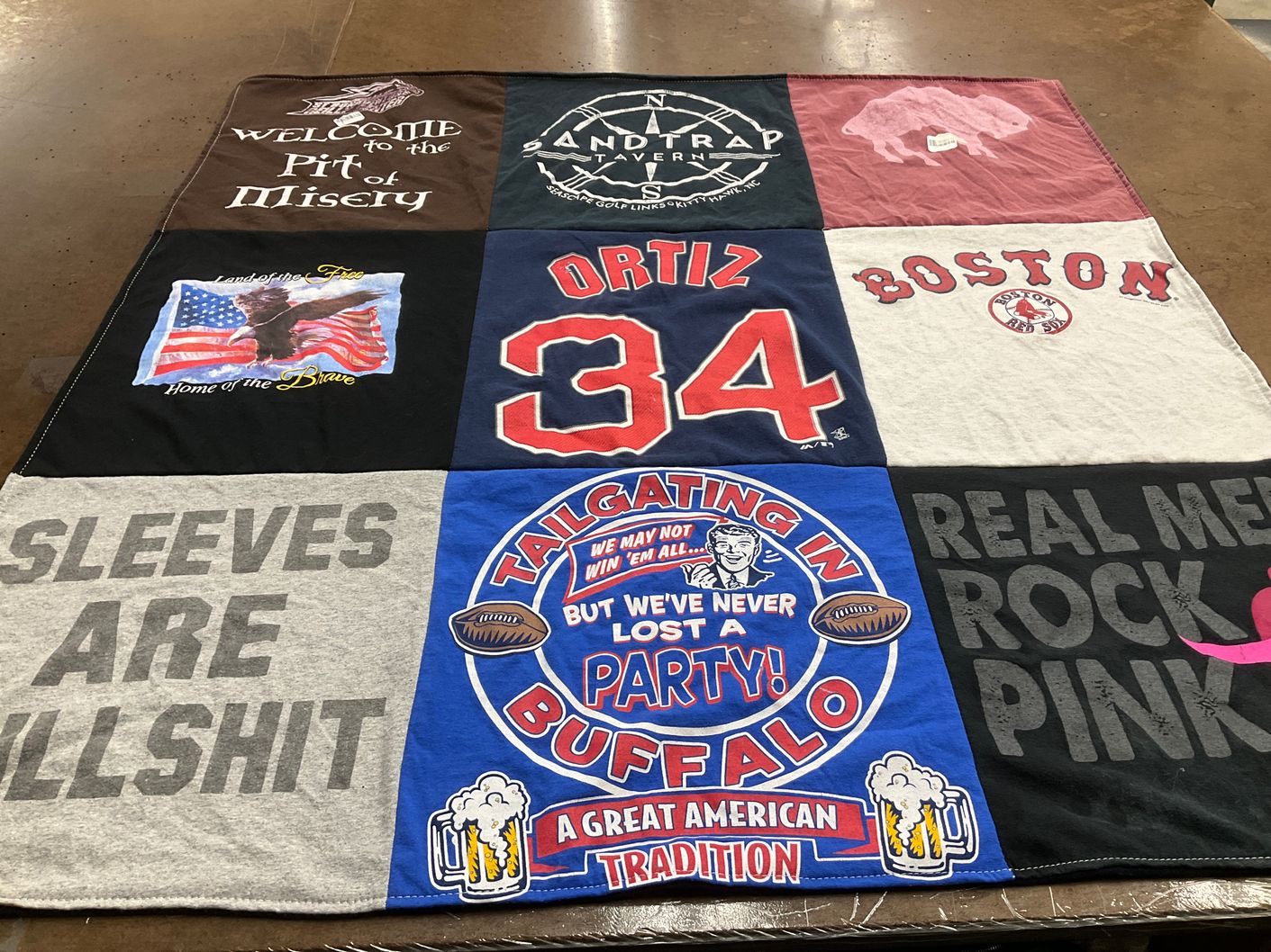 T-shirt quilt with sports, tailgating themes by Carol from FL