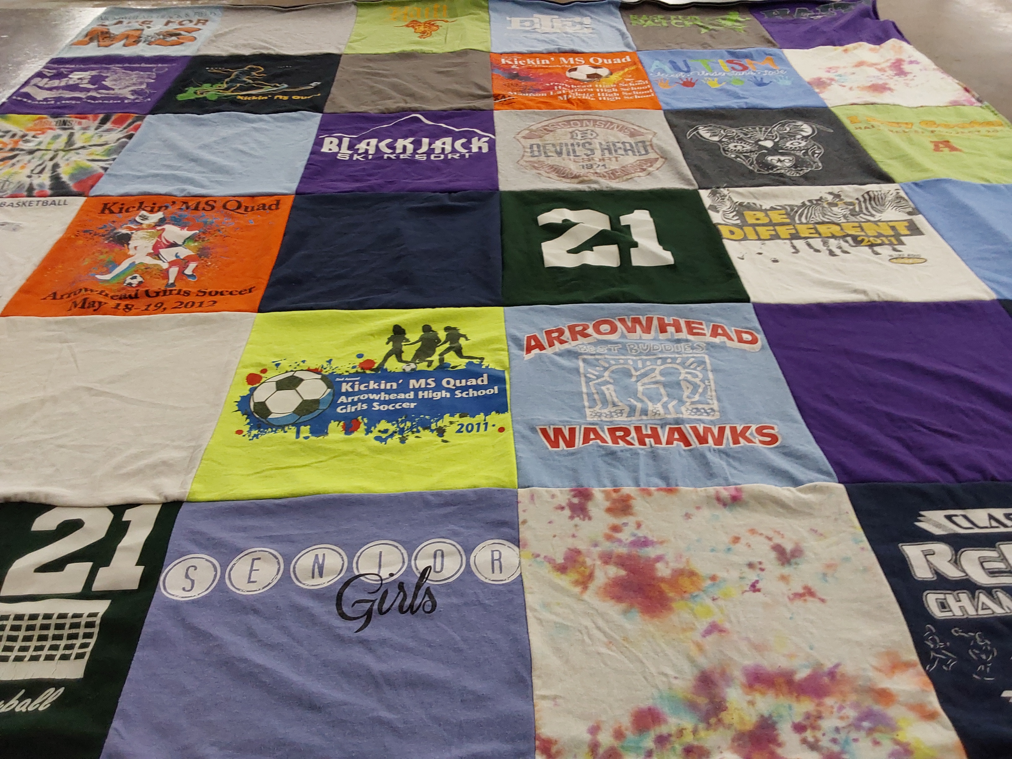 Custom Project Repat t-shirt quilt featuring shirts from arrowhead high school.