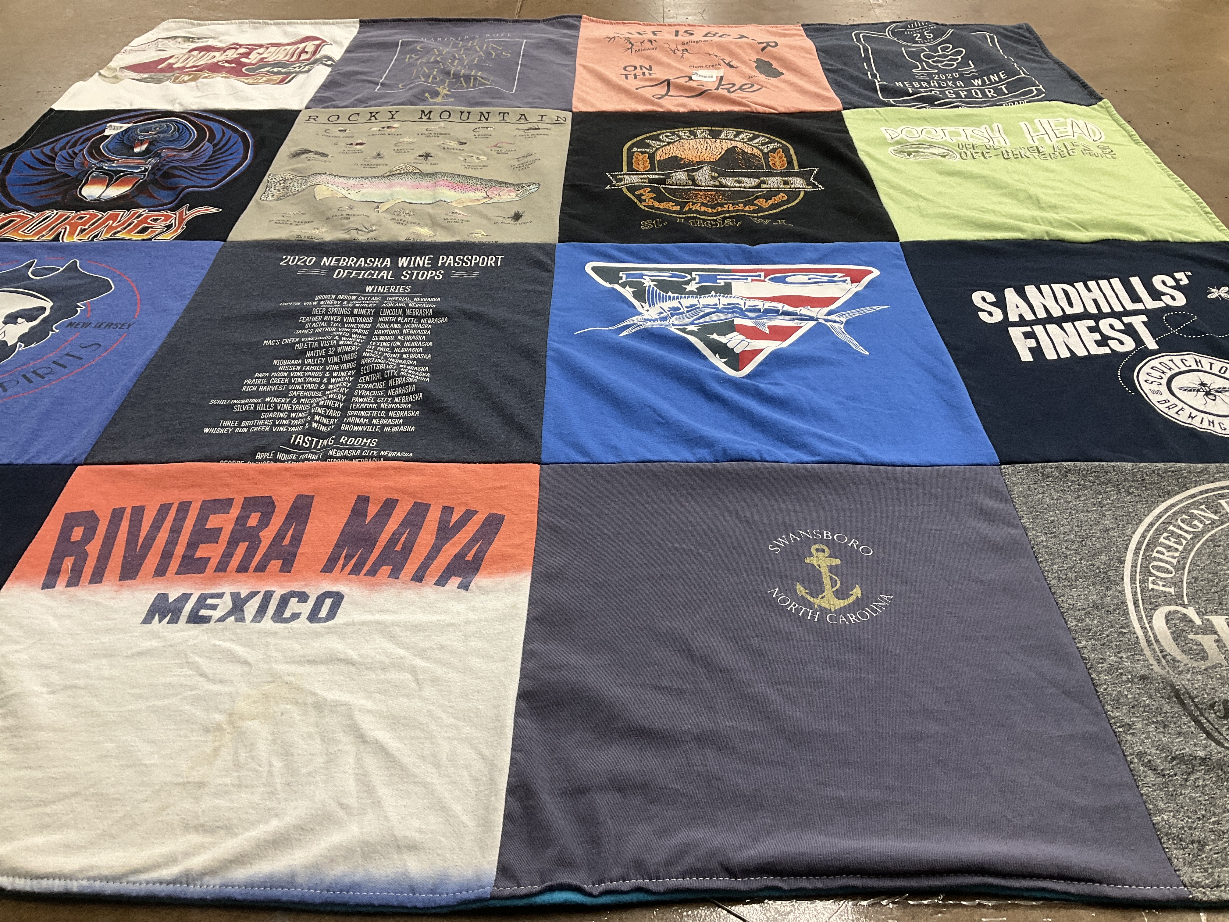 T-shirt quilt with travel, wine themes by Jennifer from NE
