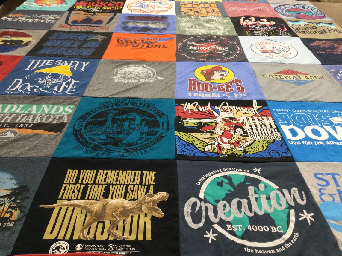 T-shirt quilt with travel, dinosaurs themes by Brooke from TX