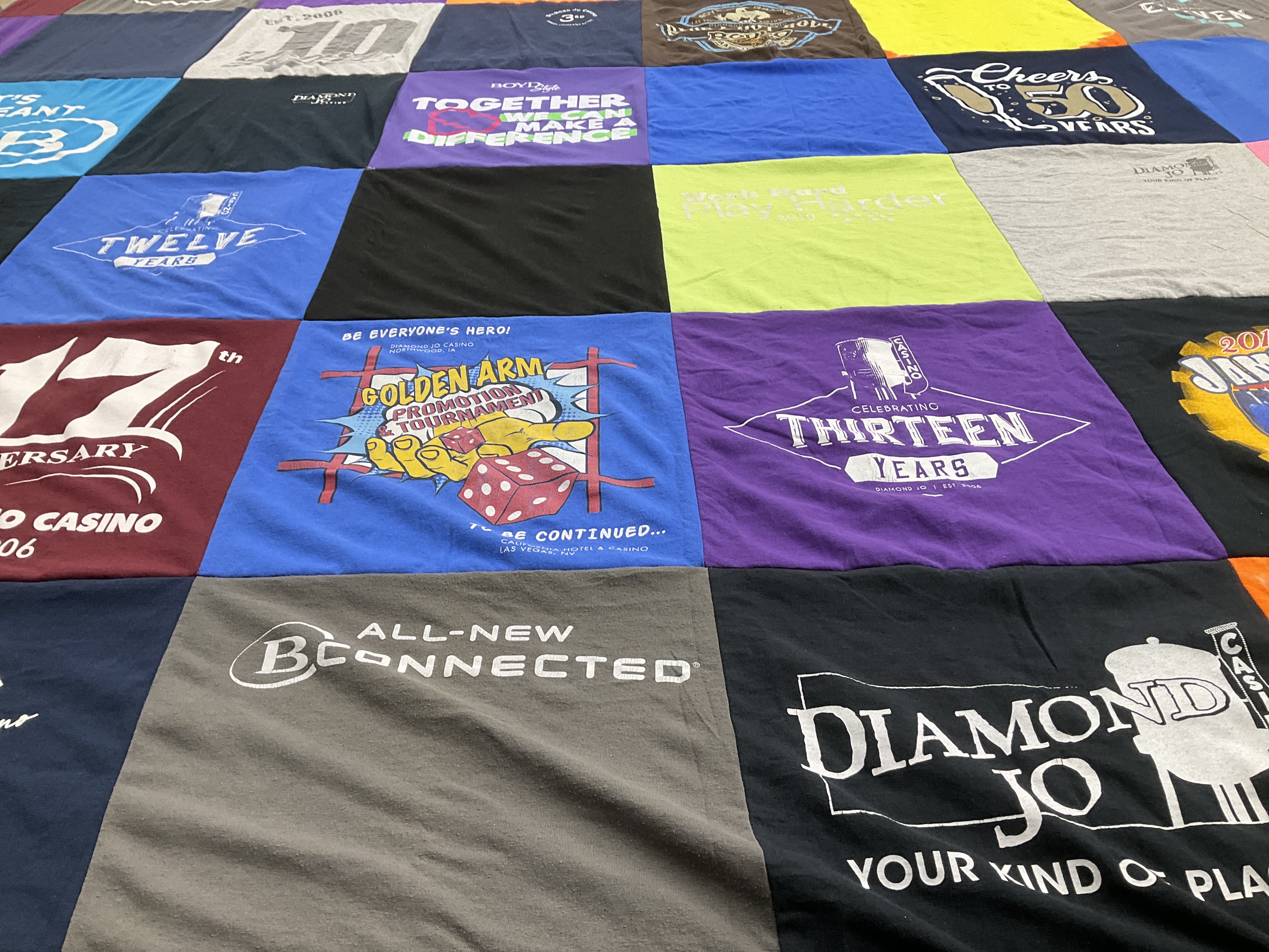 T-shirt quilt with casinos, tournaments themes by Kim from IA