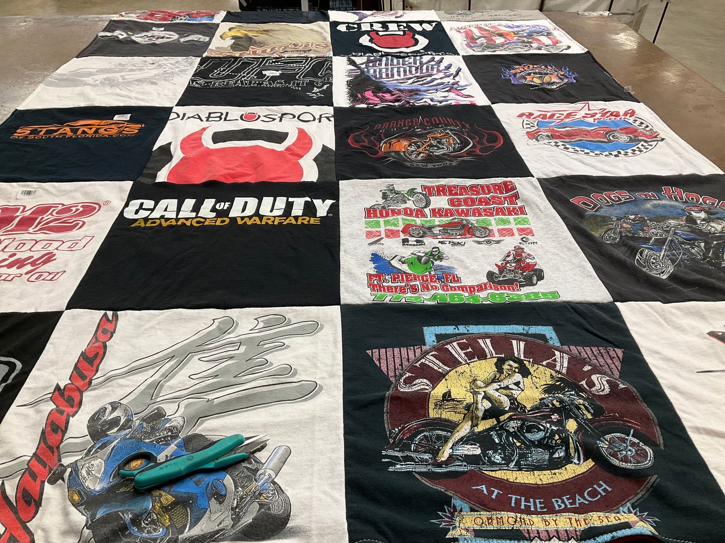 T-shirt quilt with video games, motorcycles themes by Rochella from FL