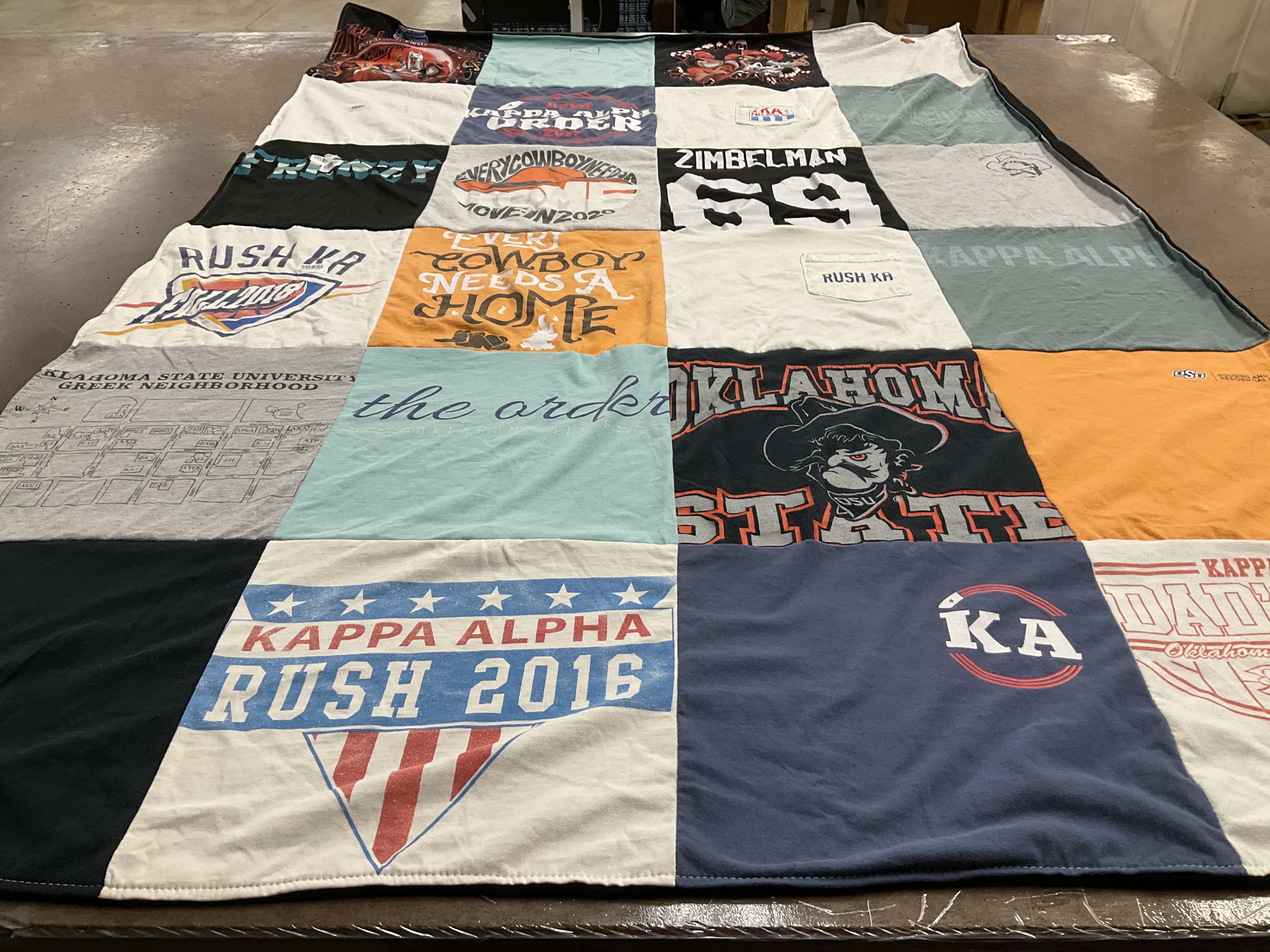 Custom Project Repat t-shirt quilt featuring shirts from oklahoma state university.