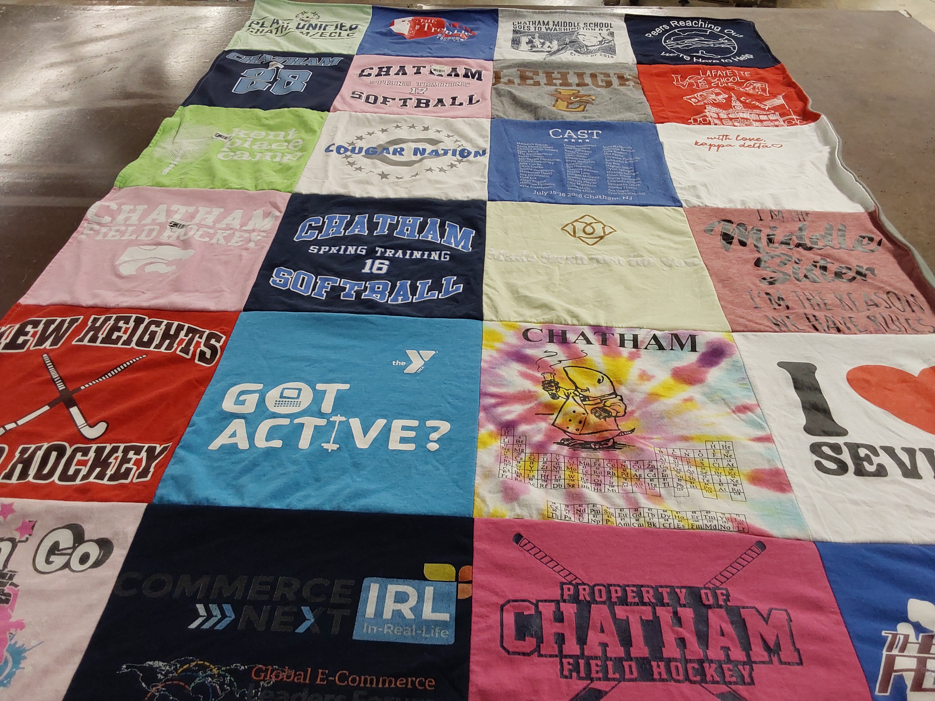Custom Project Repat t-shirt quilt featuring shirts from chatham middle school.