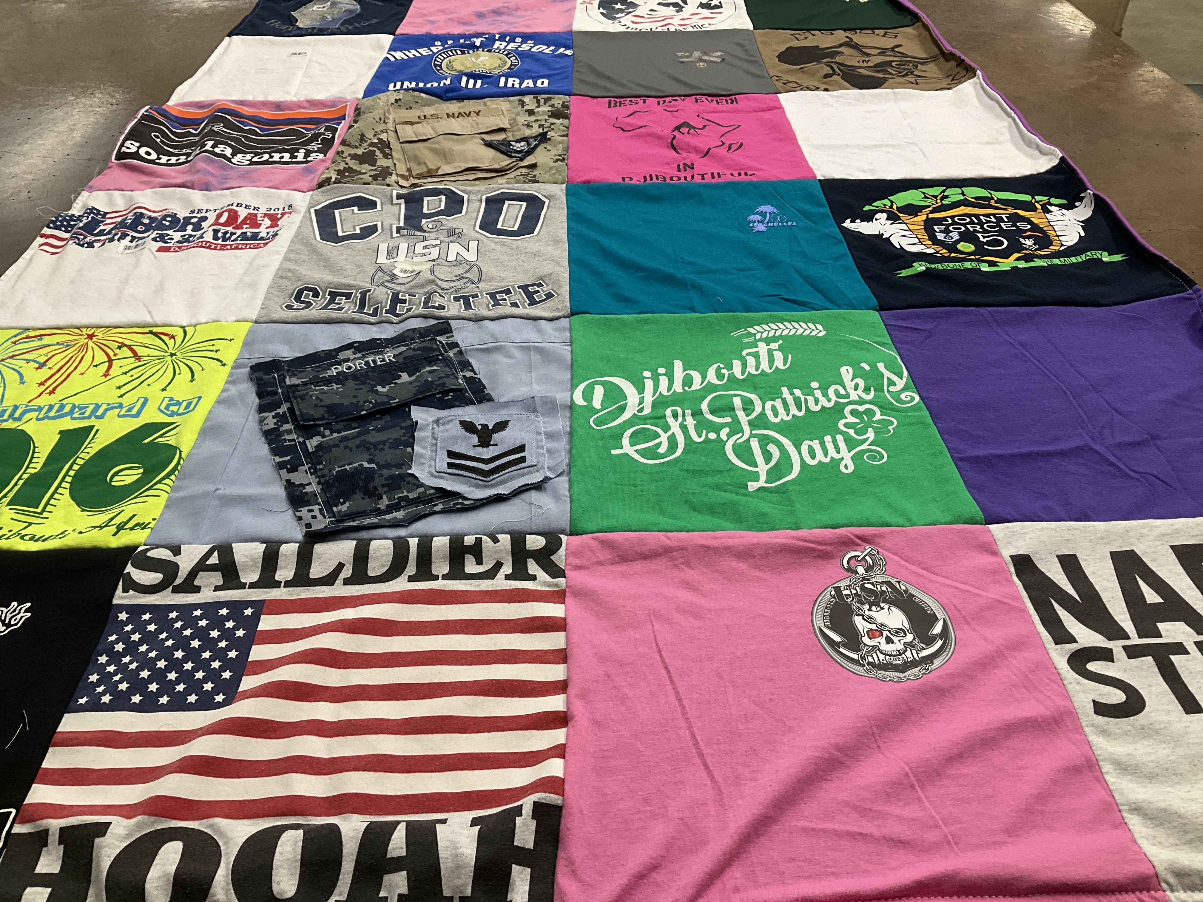 T-shirt quilt with military, fireworks themes by Teena from TX