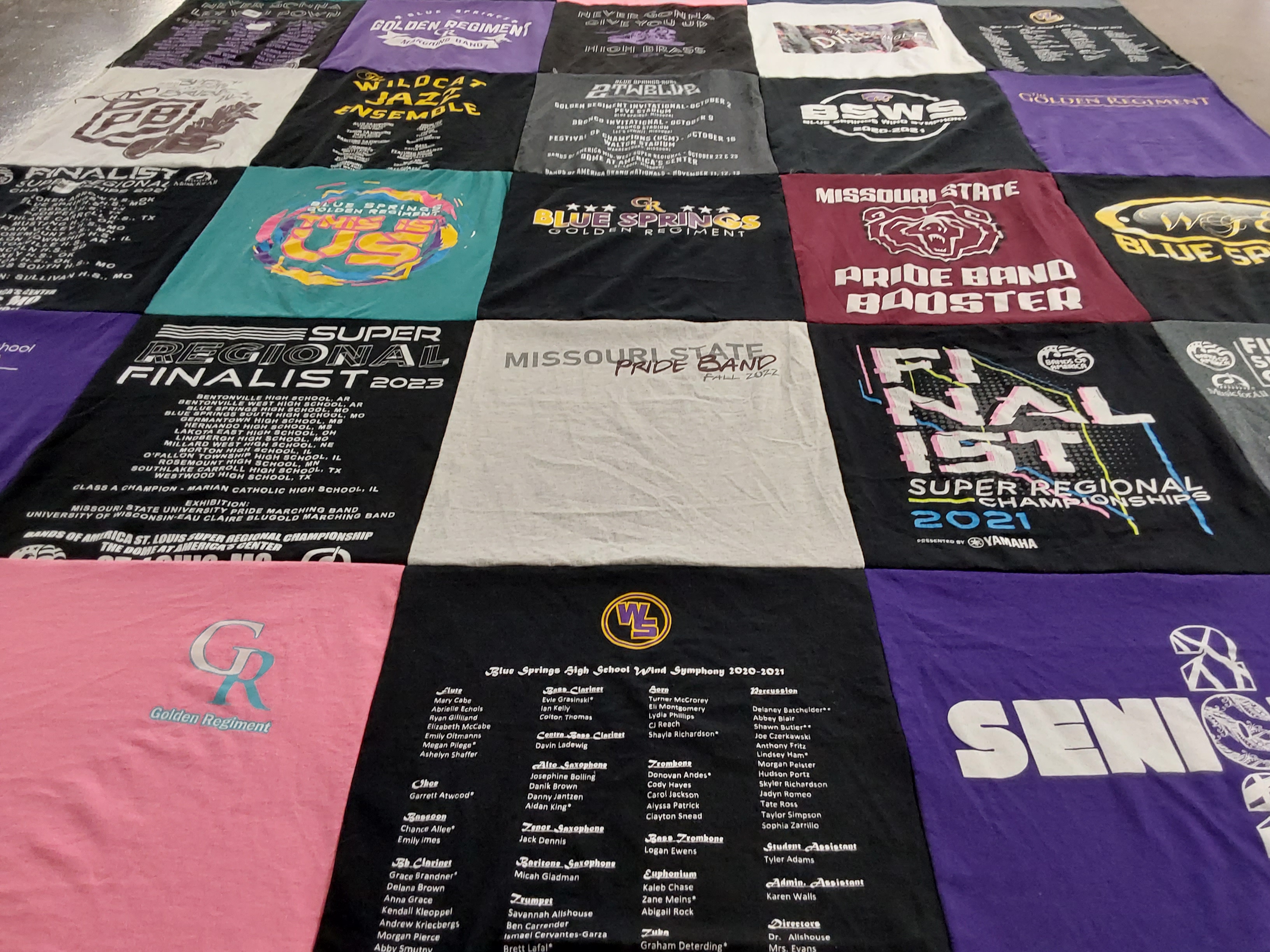 Custom Project Repat t-shirt quilt featuring shirts from missouri state university, blue springs high school.