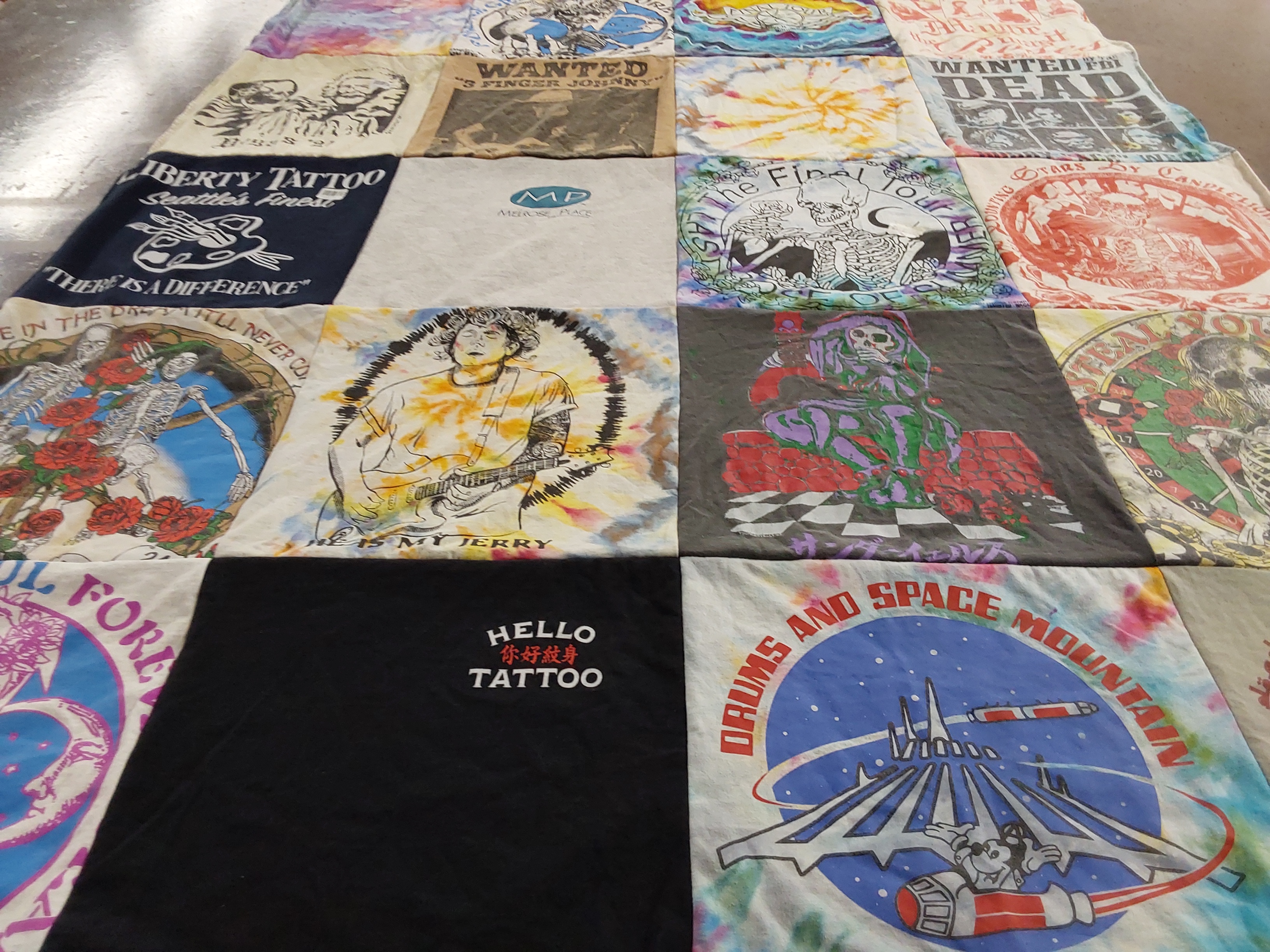 T-shirt quilt with tattoos, music themes by Kelby from WA