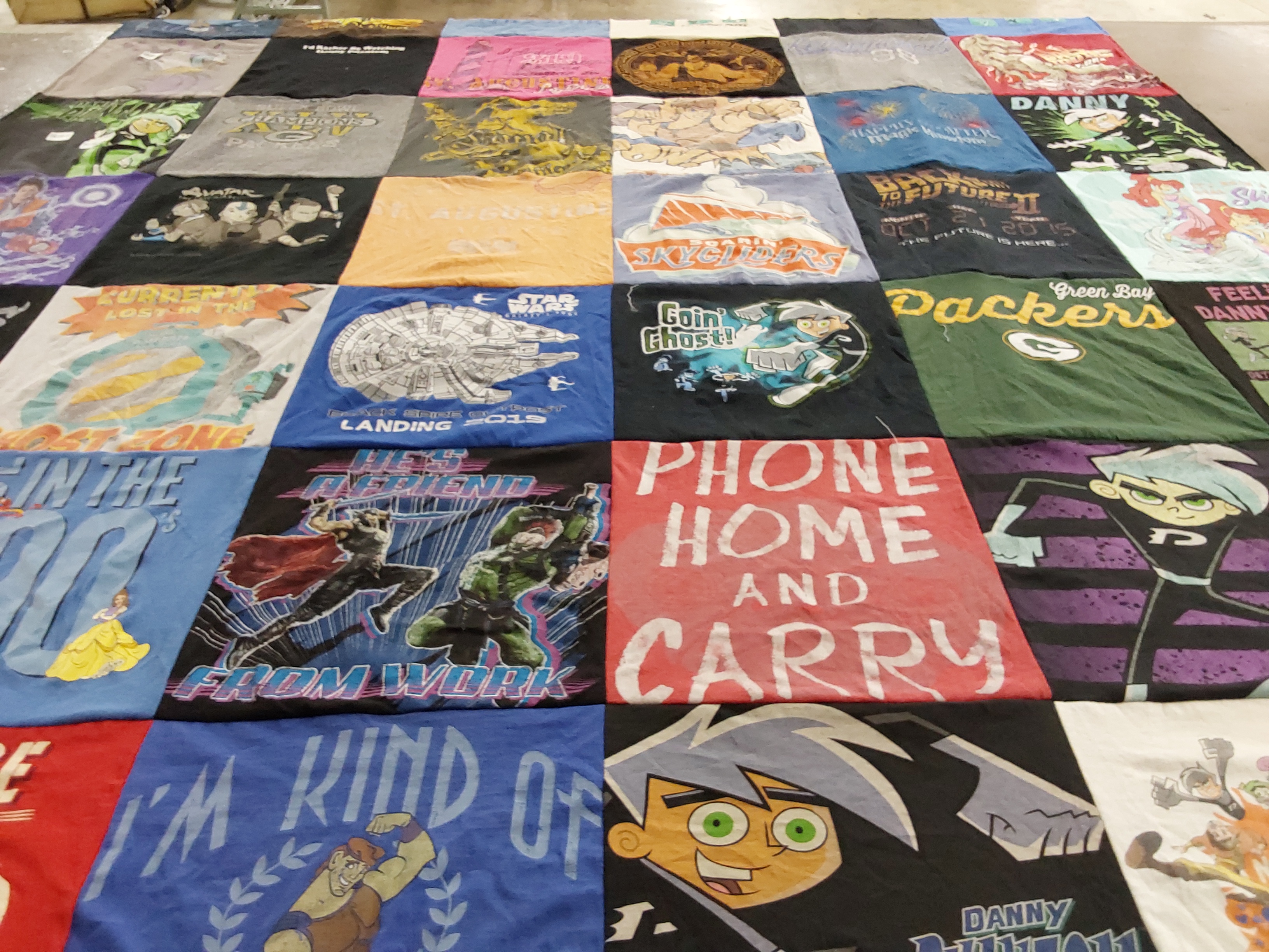 T-shirt quilt with comics, superheroes themes by Lyn from OH