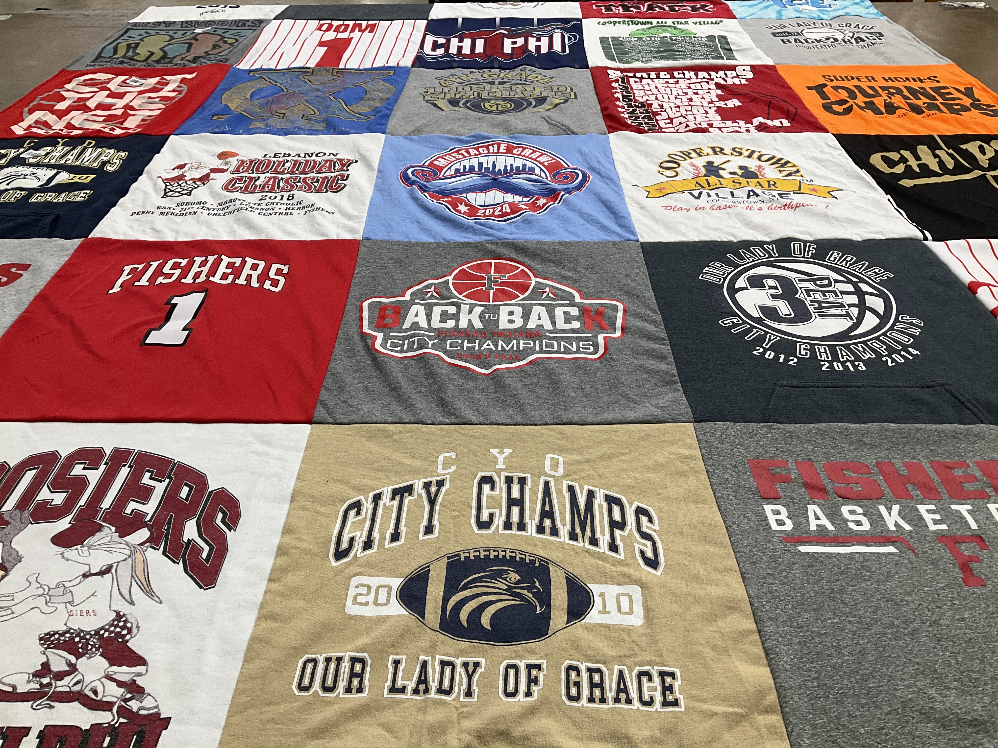 T-shirt quilt featuring our lady of grace basketball team, our lady of grace football team by Julianne from IN