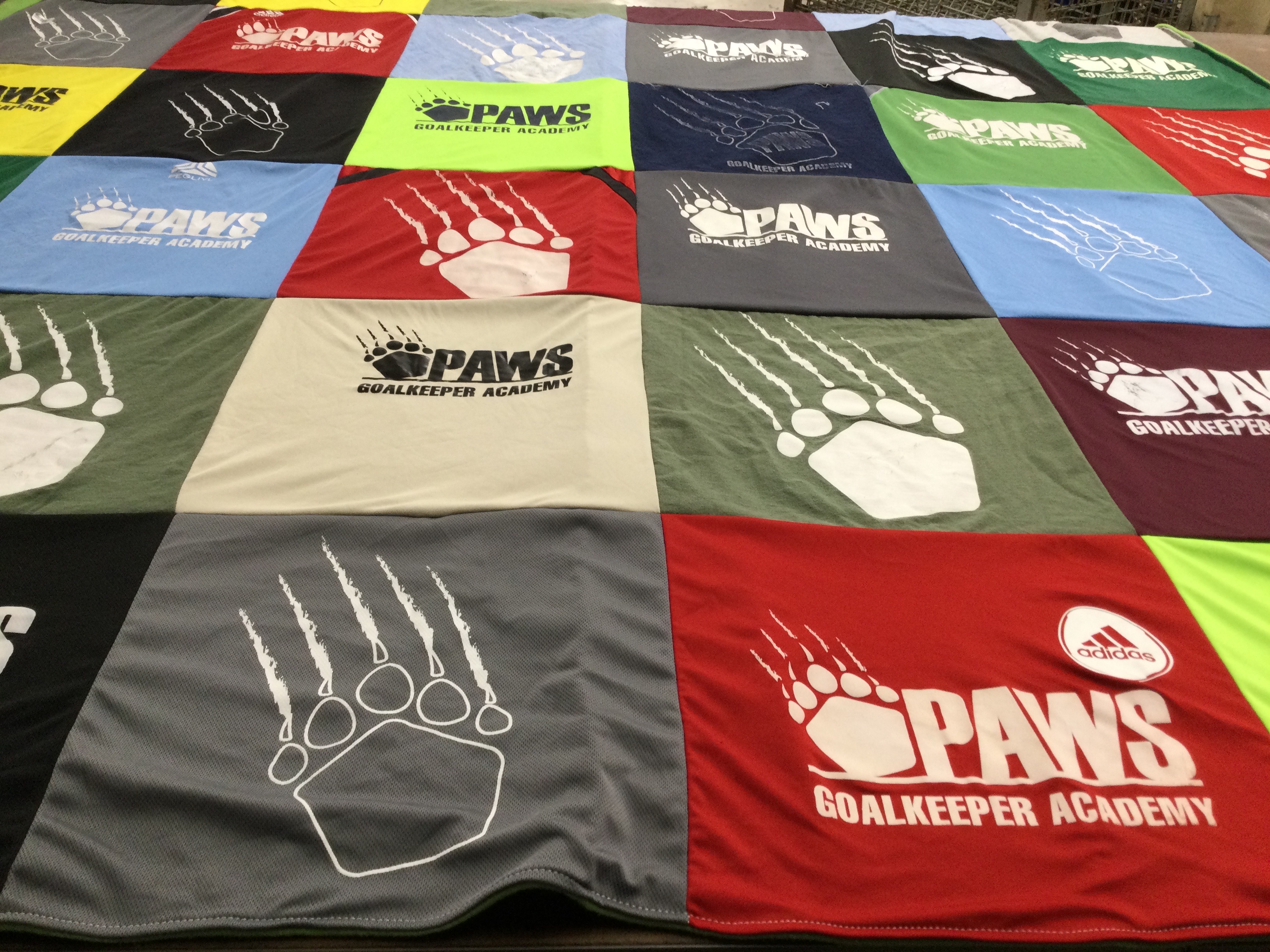 T-shirt quilt with soccer, goalkeeping themes by Sara from MI
