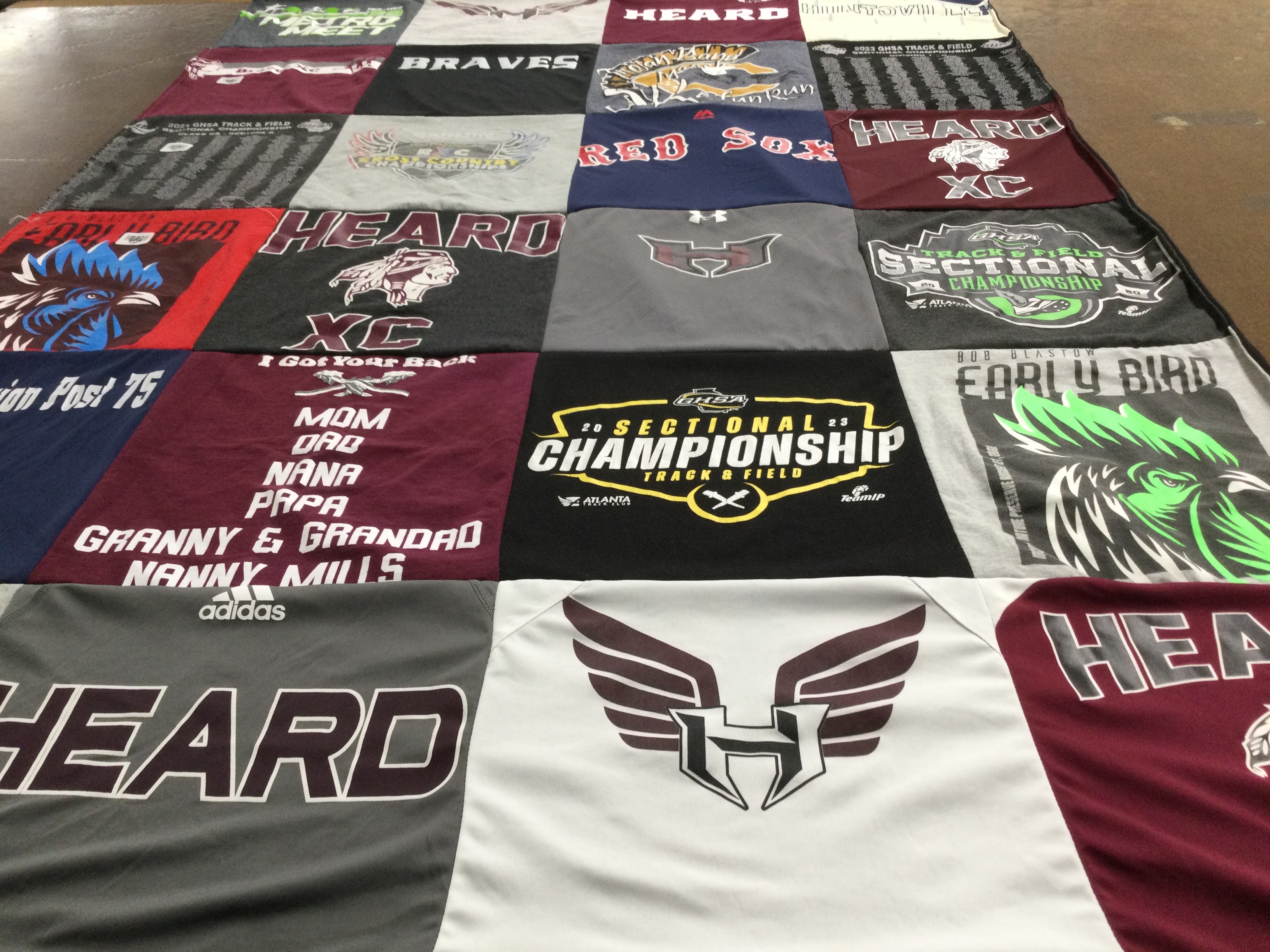 T-shirt quilt with sports, track and field themes by Amy from GA