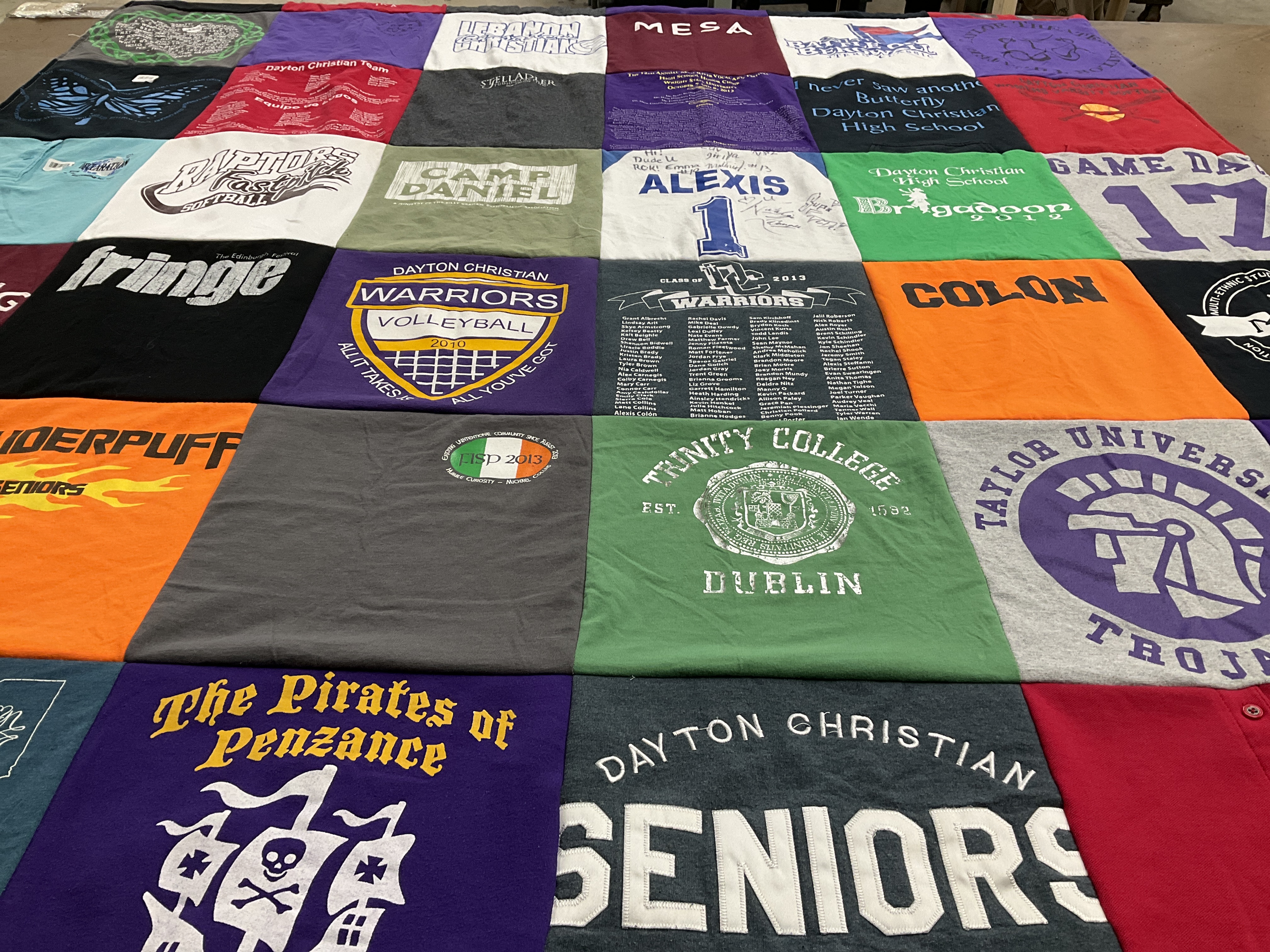 T-shirt quilt featuring dayton christian warriors, taylor university trojans by Naomi from OH