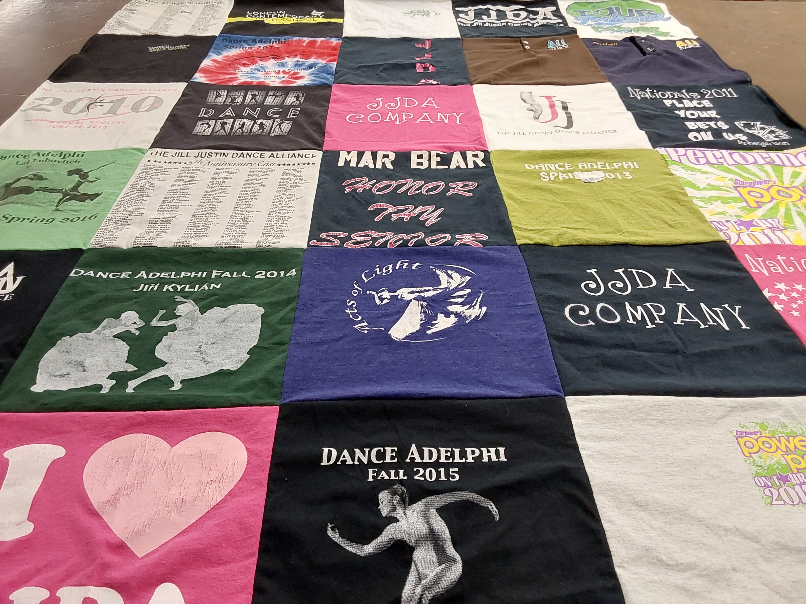 T-shirt quilt with dance, performance themes by Janie from TN