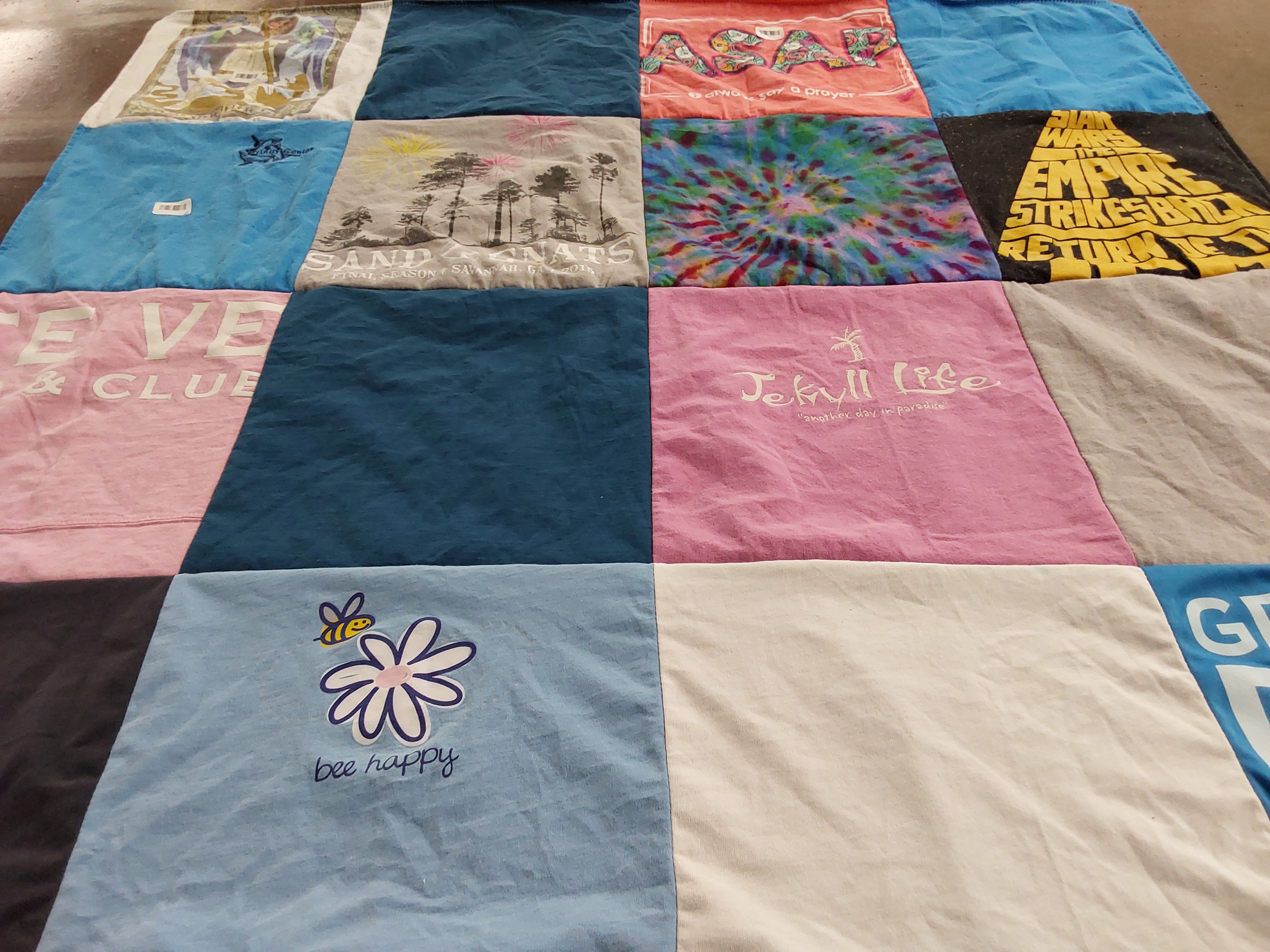 T-shirt quilt with fishing, bees themes by Mary from GA