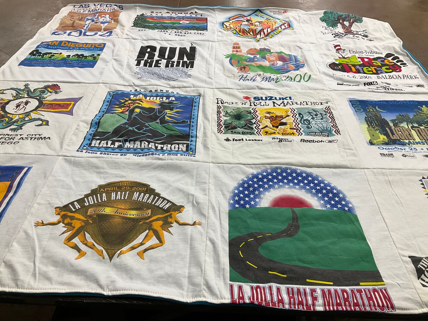 T-shirt quilt with marathons, running themes by ELIZABETH from CA