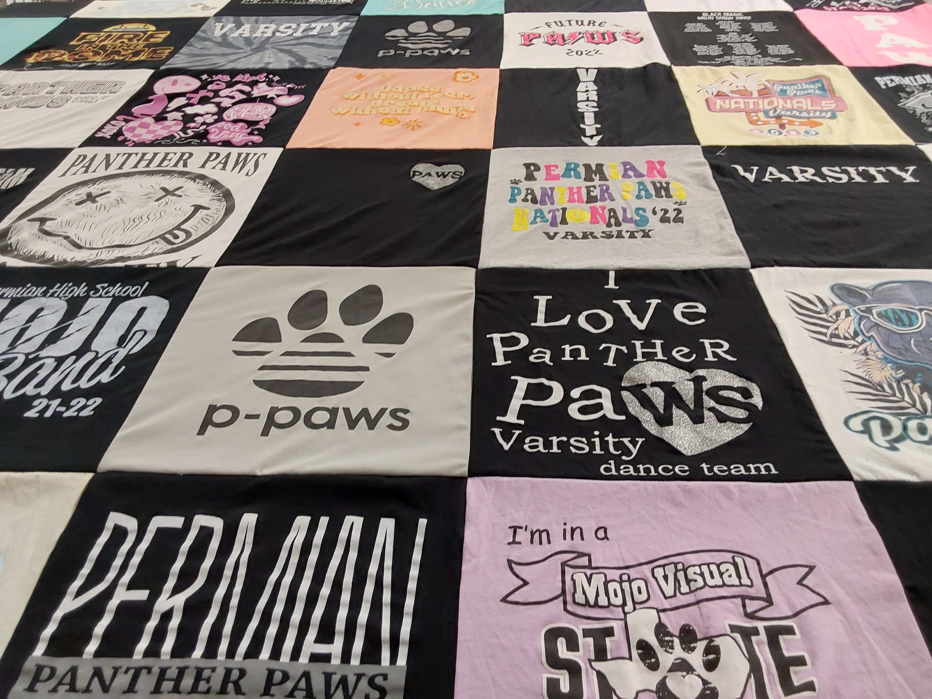 T-shirt quilt featuring perman panther paws varsity dance team by Danna from TX