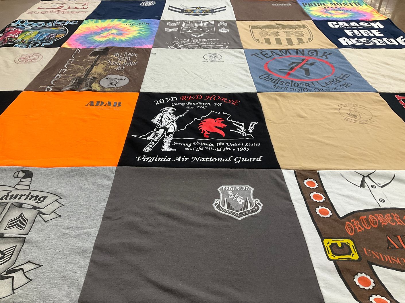 T-shirt quilt with military, firefighting themes by Christina from VA