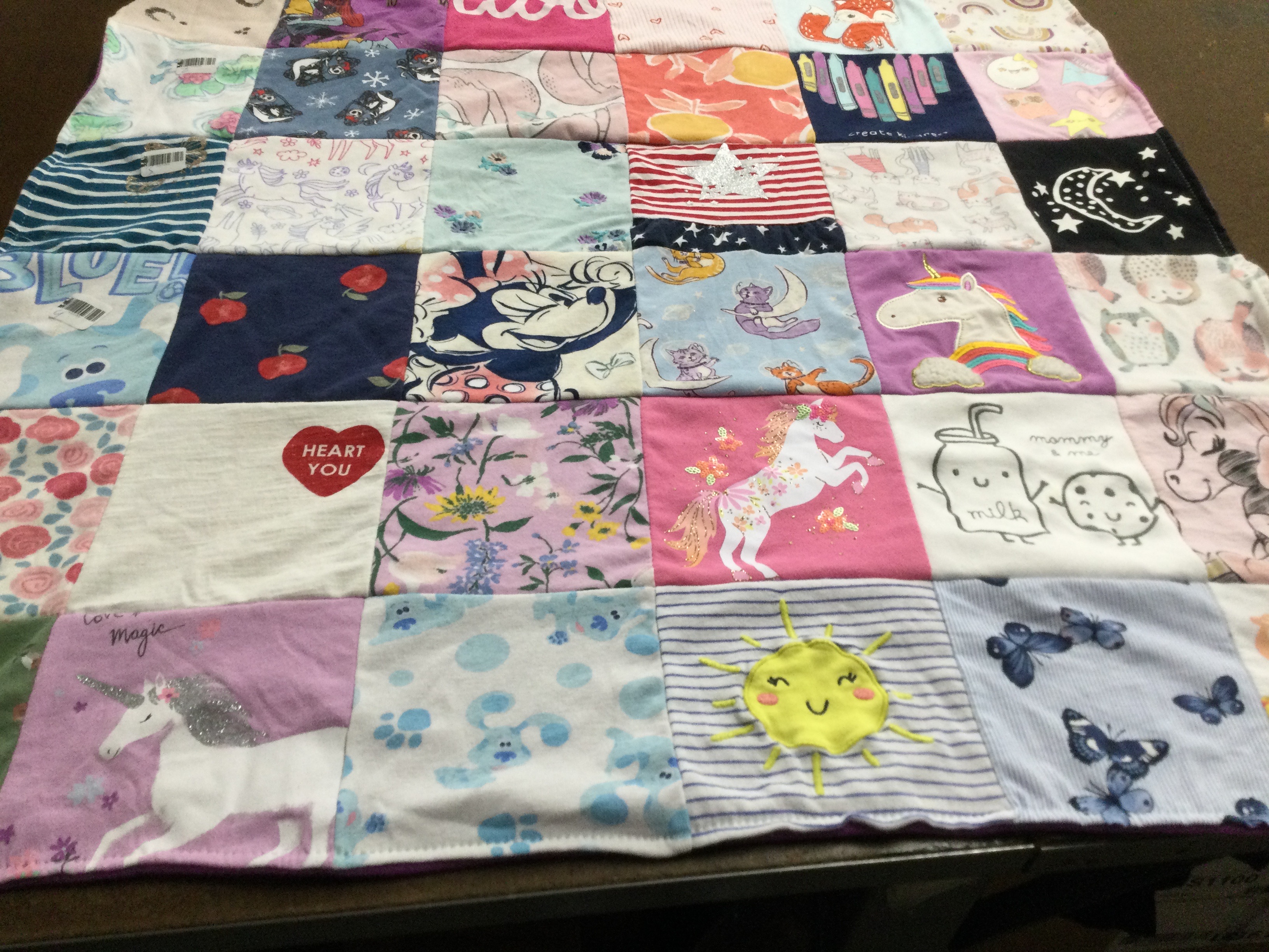 T-shirt quilt with unicorns, nature themes by Daniel from NC