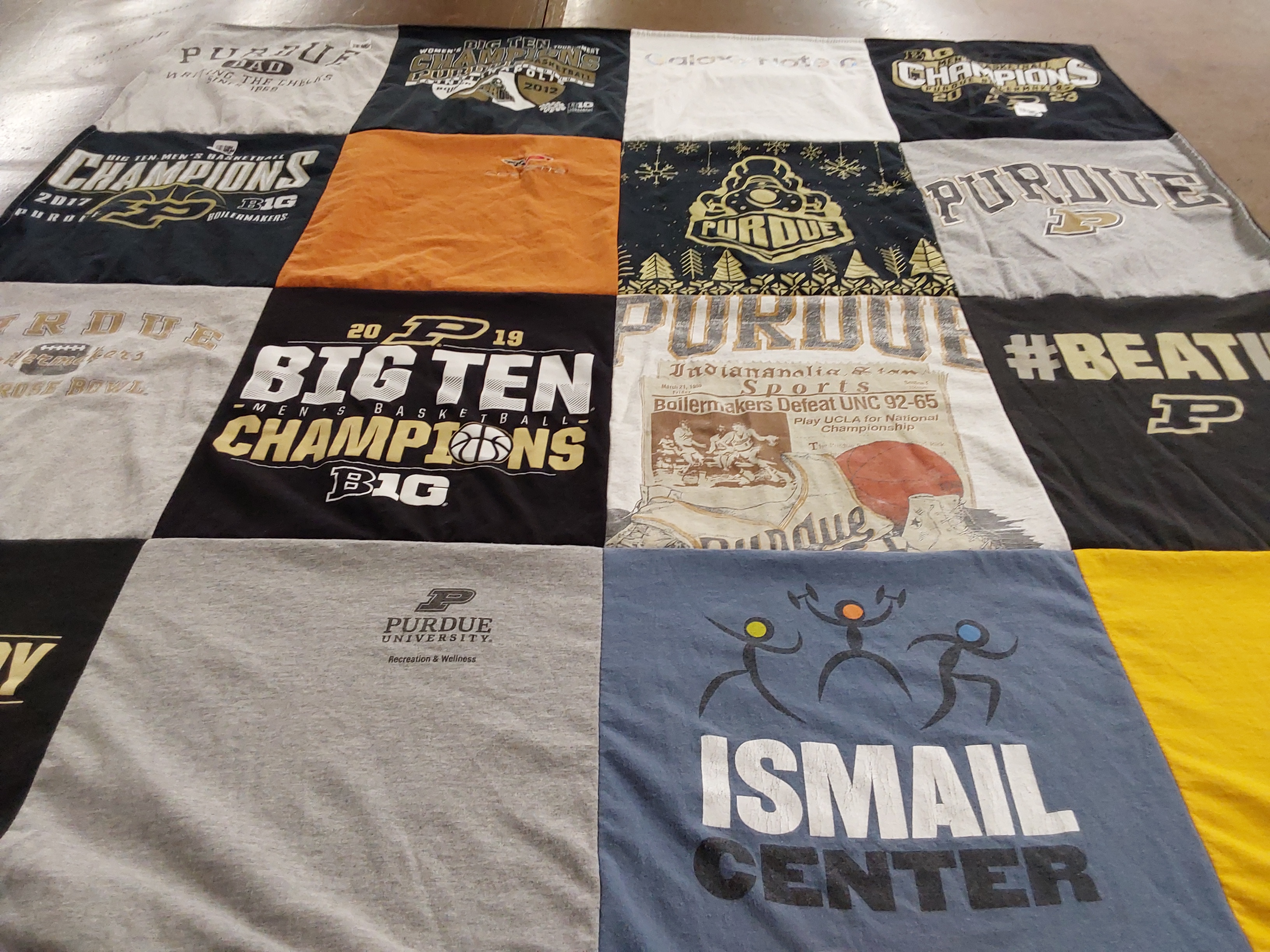 Custom Project Repat t-shirt quilt featuring shirts from purdue university.
