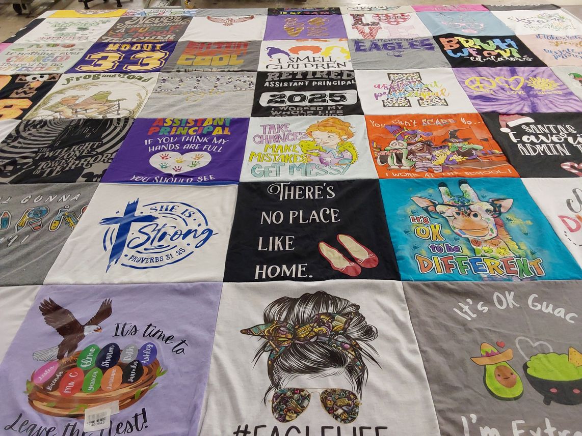 T-shirt quilt with education, inclusivity themes by Loretta from LA