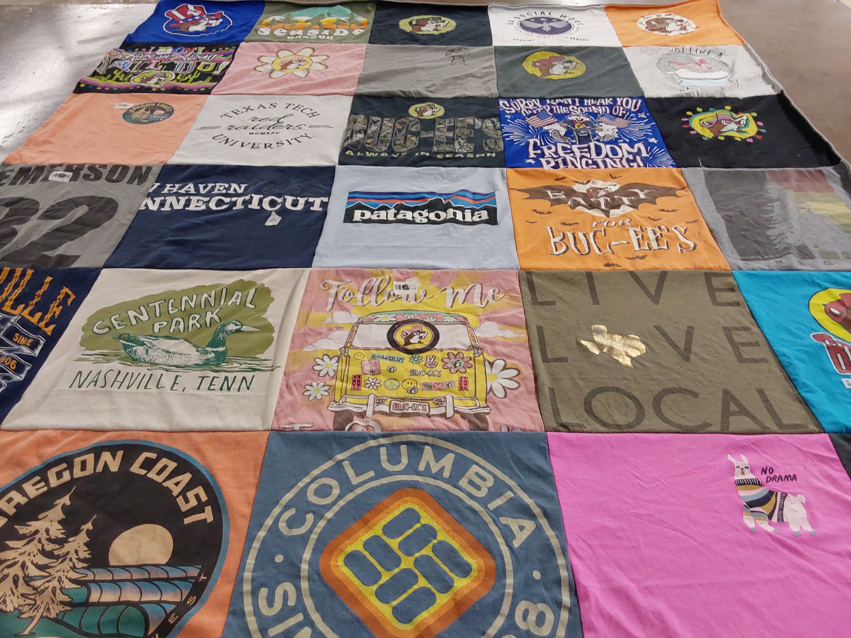 Custom Project Repat t-shirt quilt featuring shirts from texas tech university, emerson college.