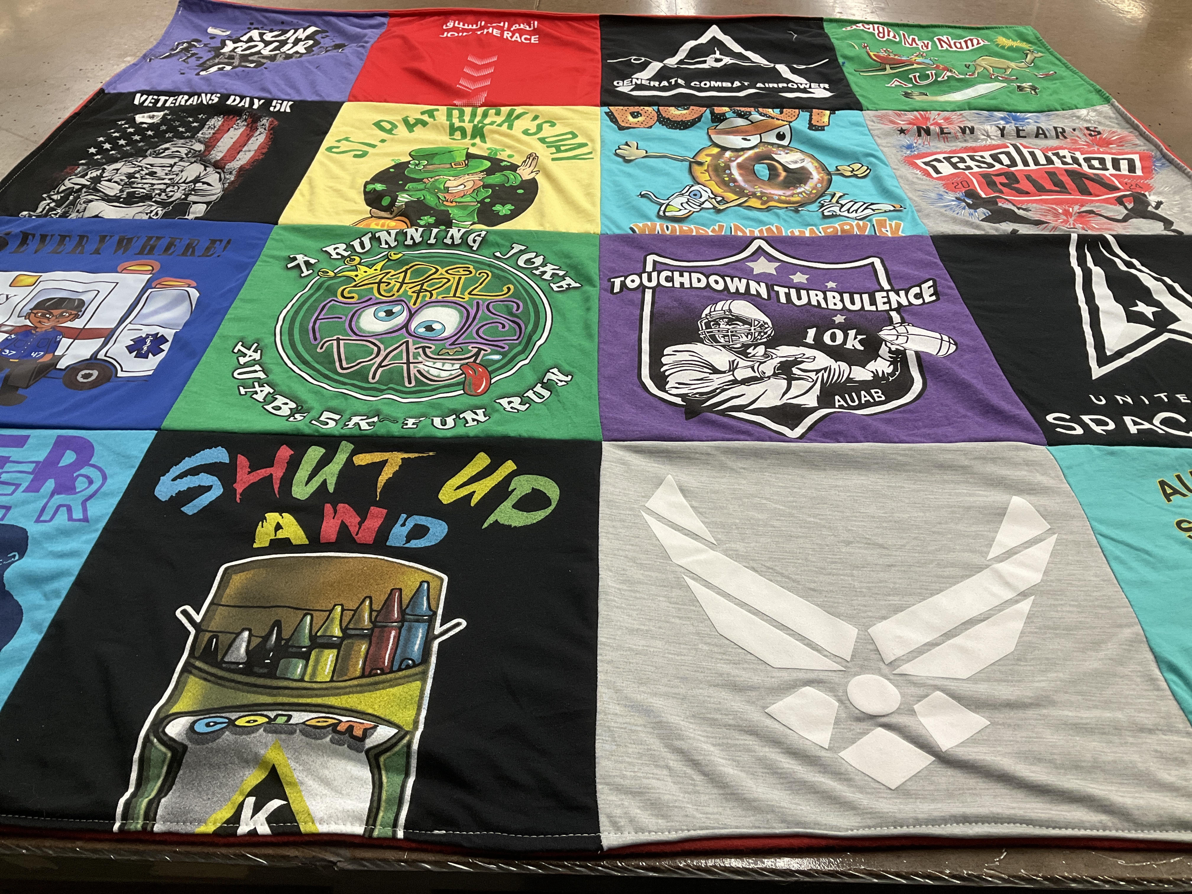 T-shirt quilt with running, fun runs themes by Ashley from NJ