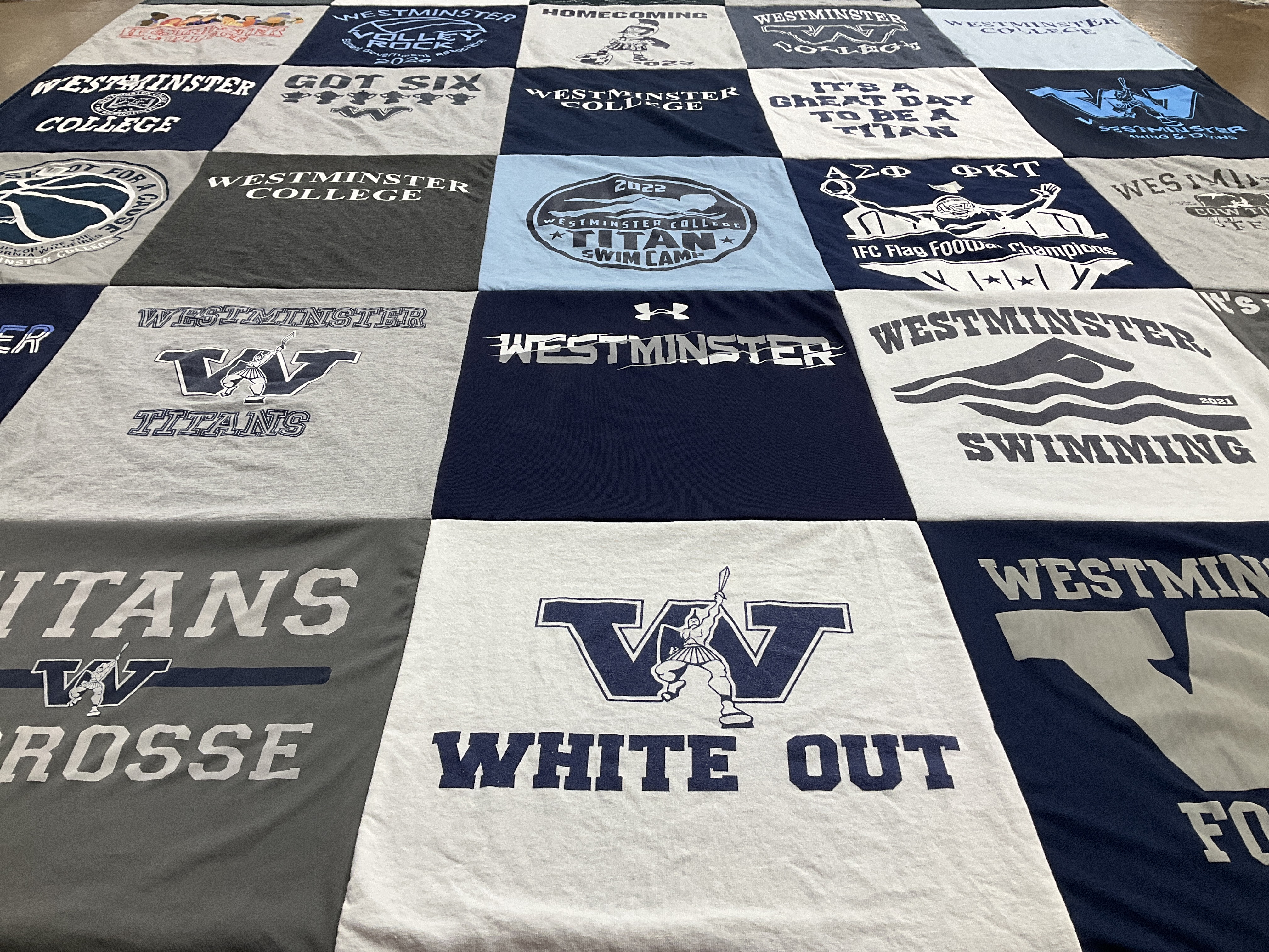 Custom Project Repat t-shirt quilt featuring shirts from westminster college.