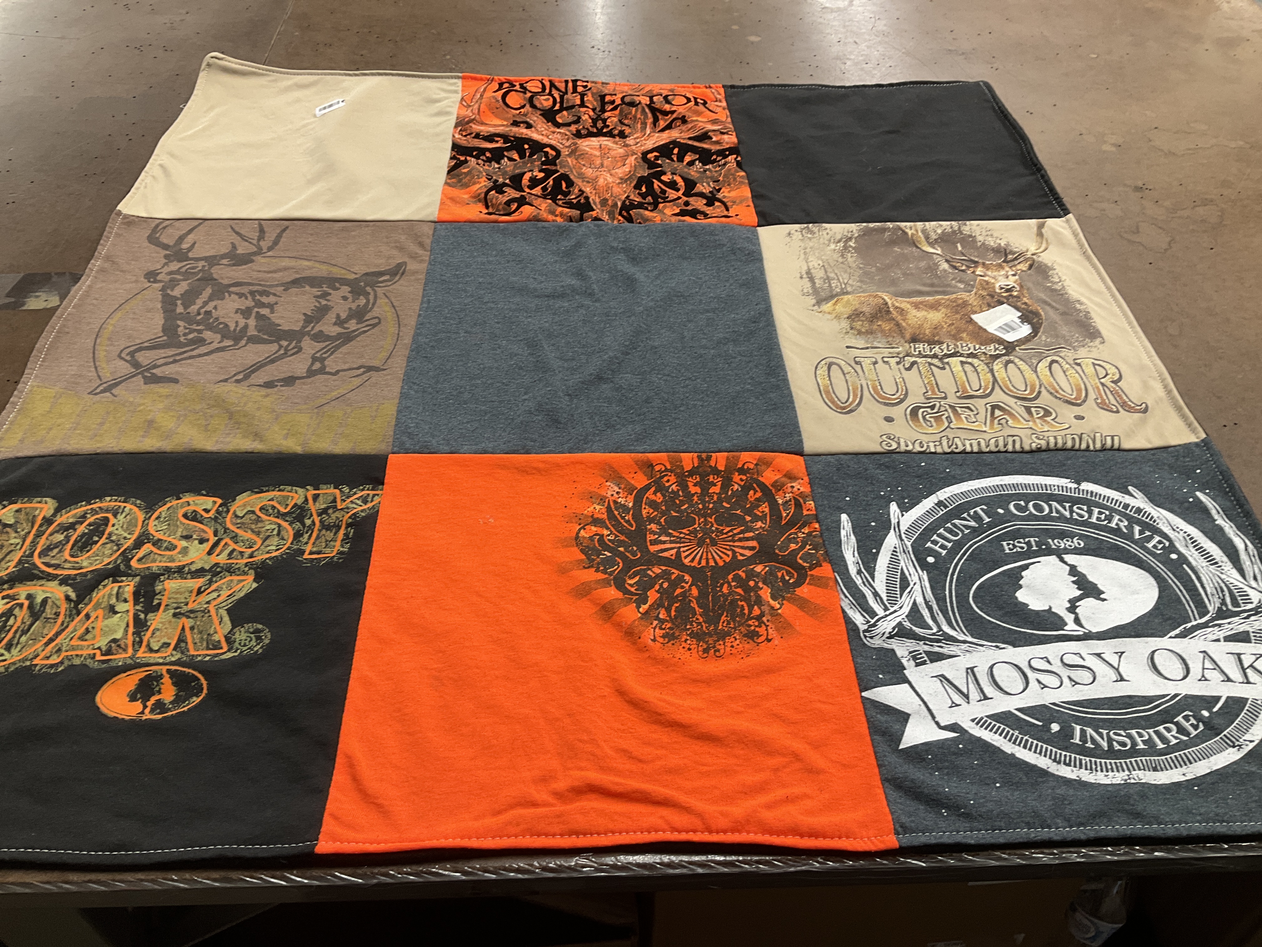 T-shirt quilt with hunting, outdoors themes by Holly from ME