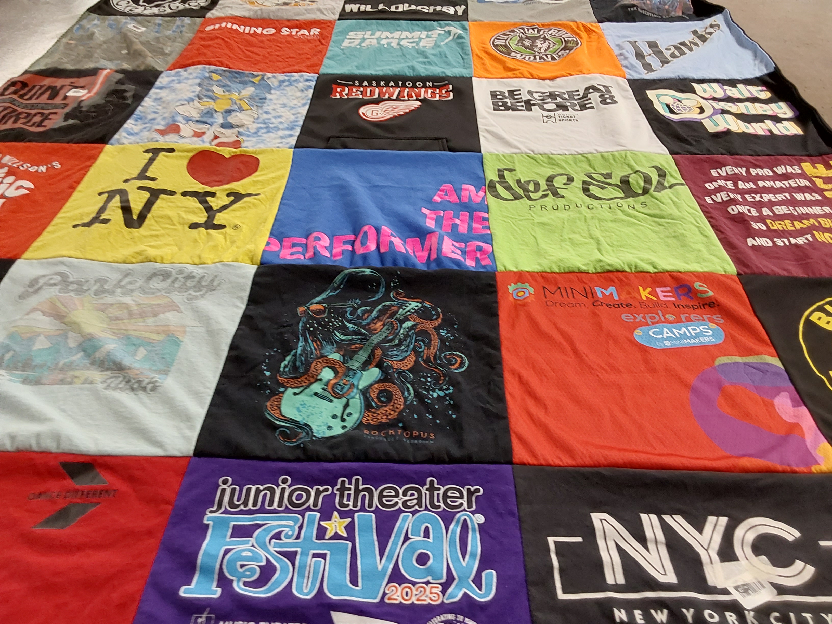 T-shirt quilt with theater, music themes by Alexis from SK