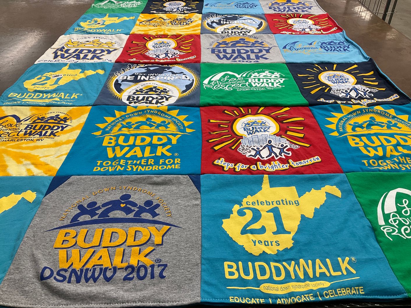 T-shirt quilt with down syndrome awareness, community events themes by Marsha from WV