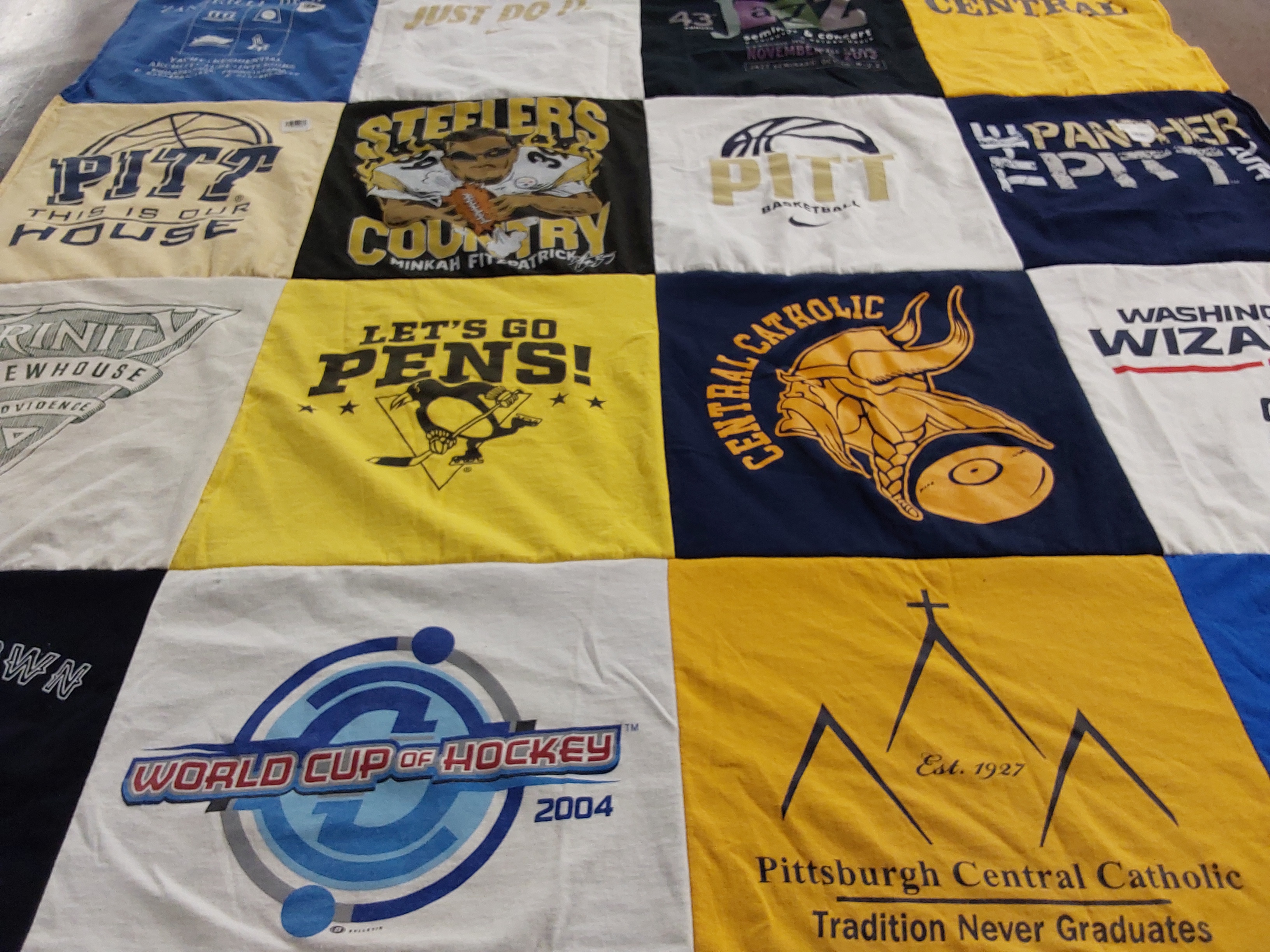 T-shirt quilt featuring pittsburgh penguins, pittsburgh steelers by Joan from PA
