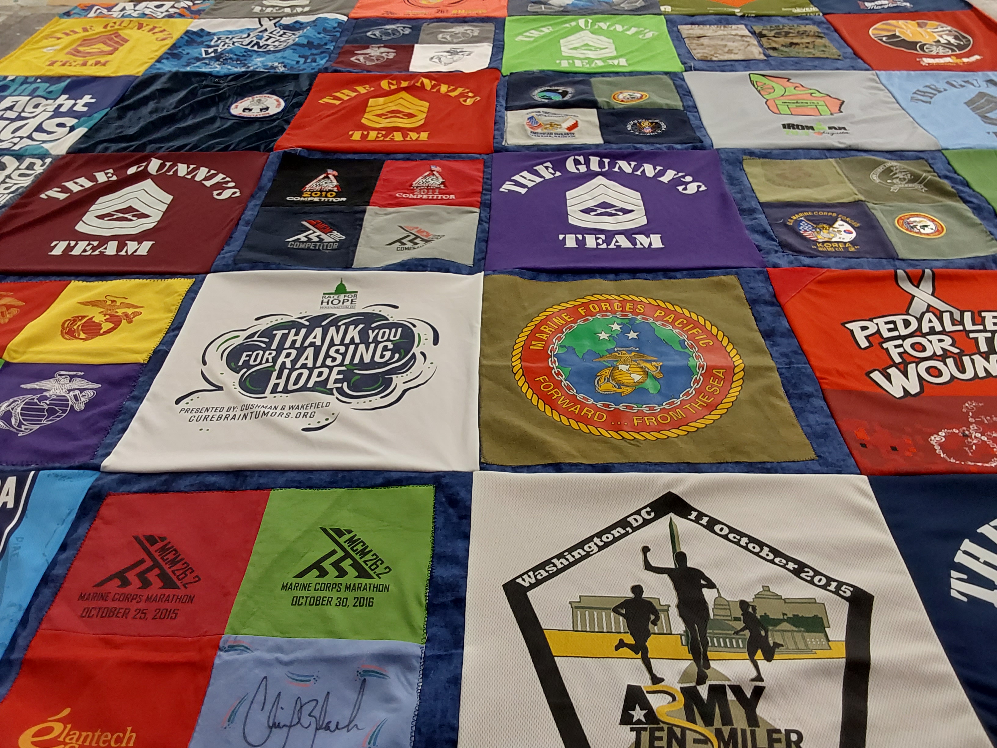 T-shirt quilt with running, charity themes by Kristine from VA
