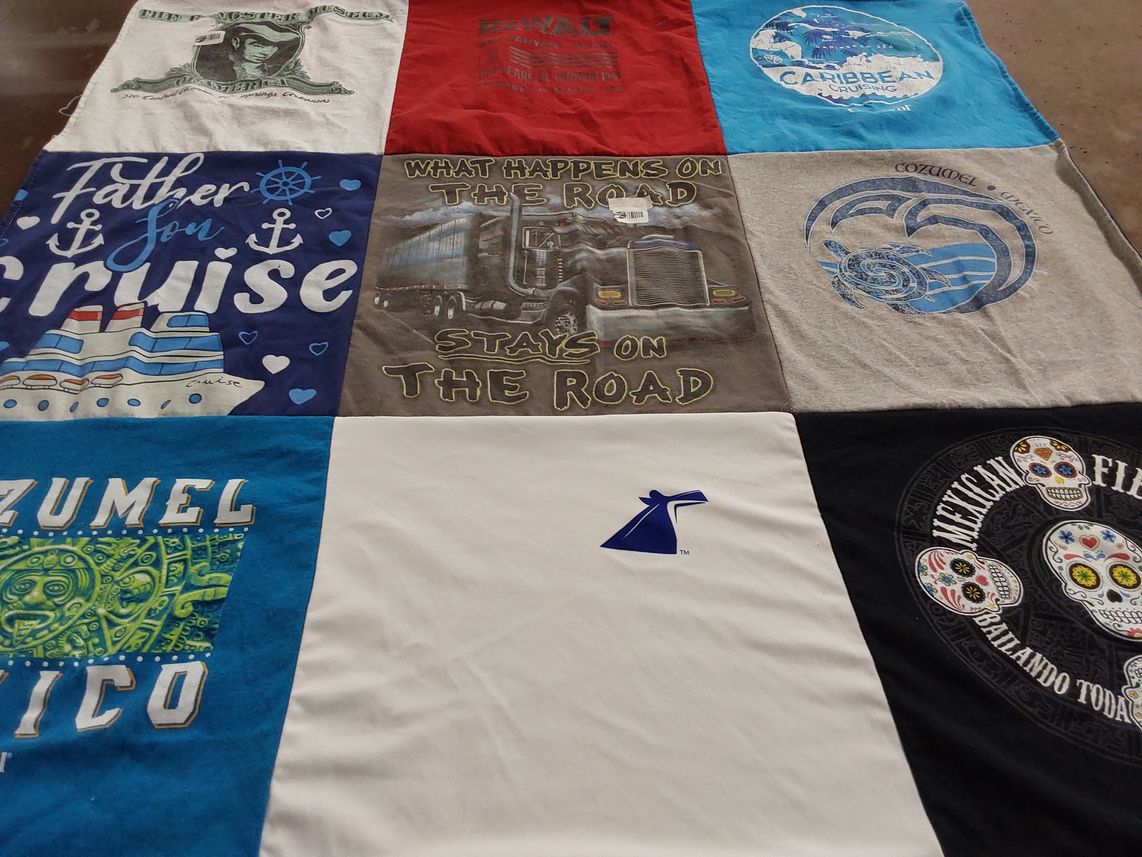 T-shirt quilt with cruising, travel themes by Carey from LA