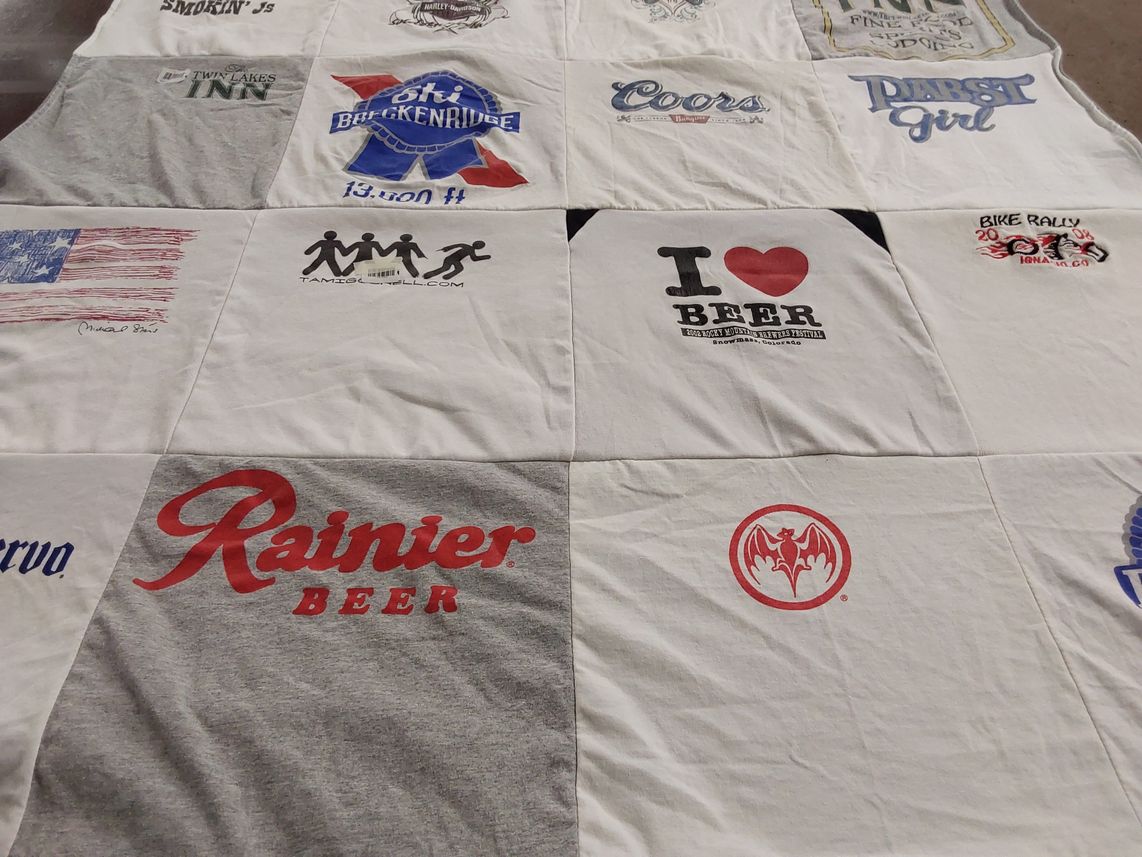 T-shirt quilt with beer appreciation, skiing themes by Bobbie from CO