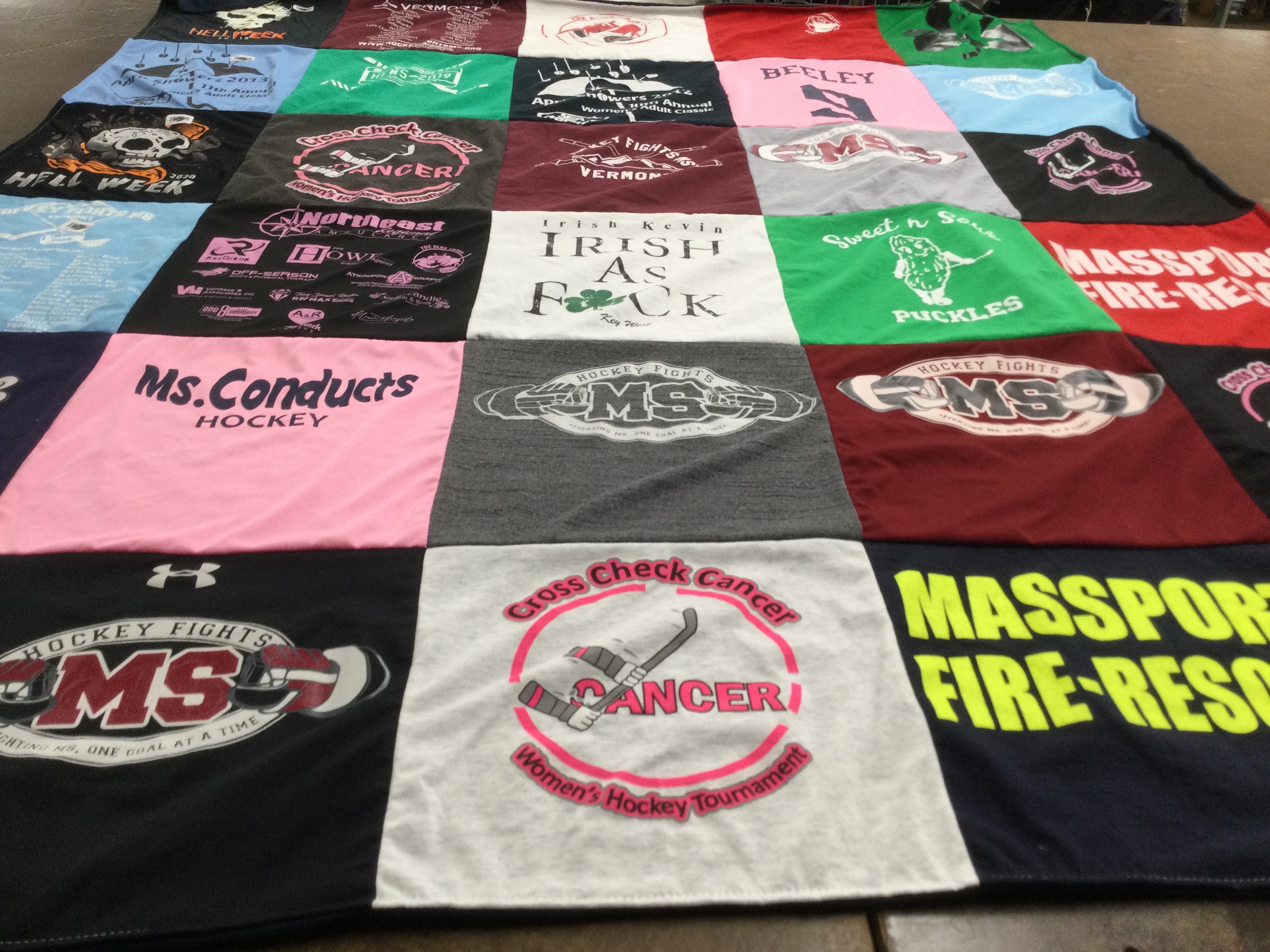 T-shirt quilt with hockey, charity events themes by Dusty from MA