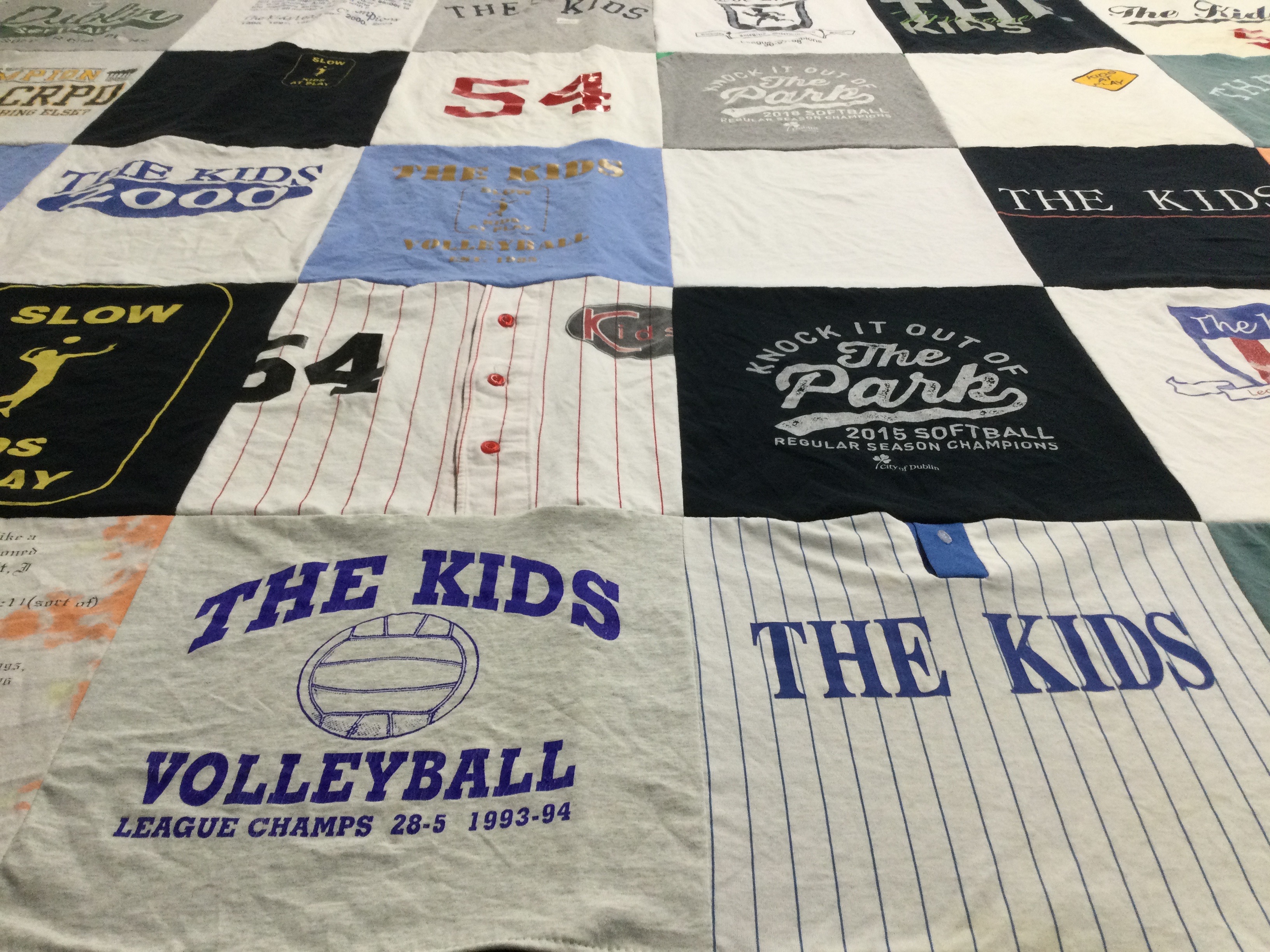 T-shirt quilt with sports, volleyball themes by Larry from OH