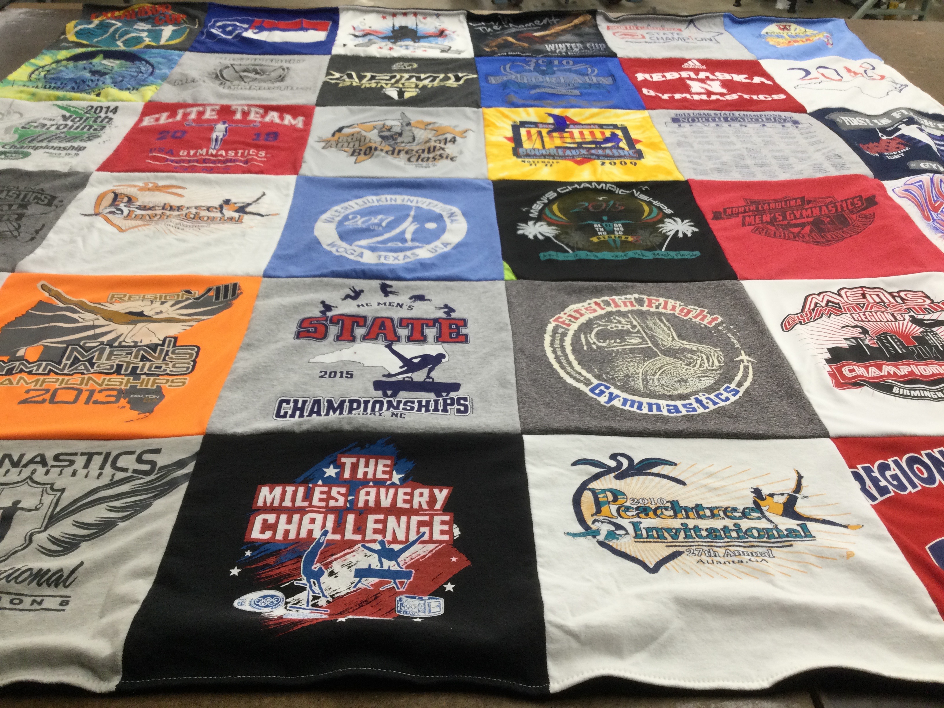 T-shirt quilt with gymnastics, sports themes by Beth from NC