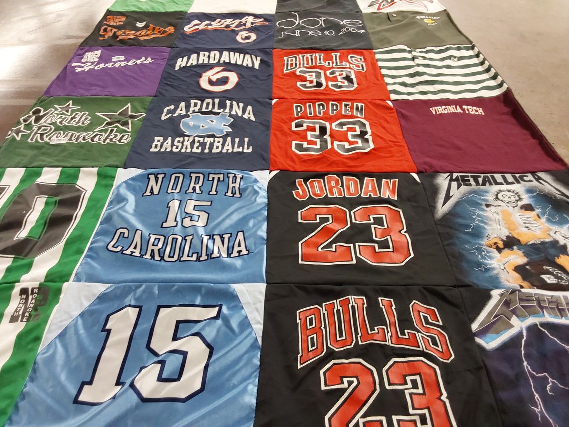 T-shirt quilt featuring north carolina tar heels, chicago bulls by Cynthia from FL