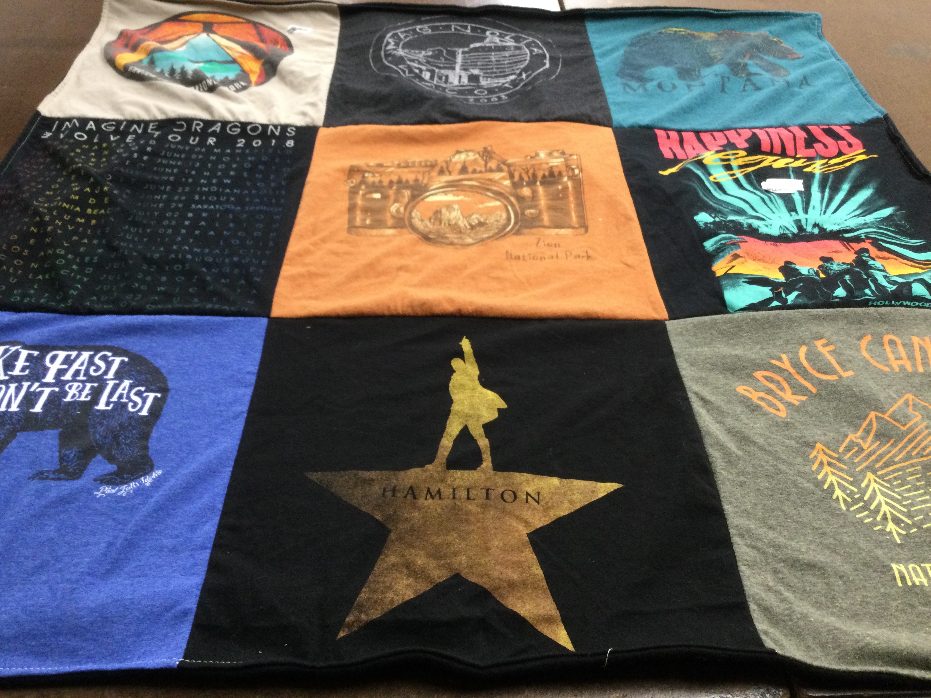 T-shirt quilt with music, travel themes by Arely from KS