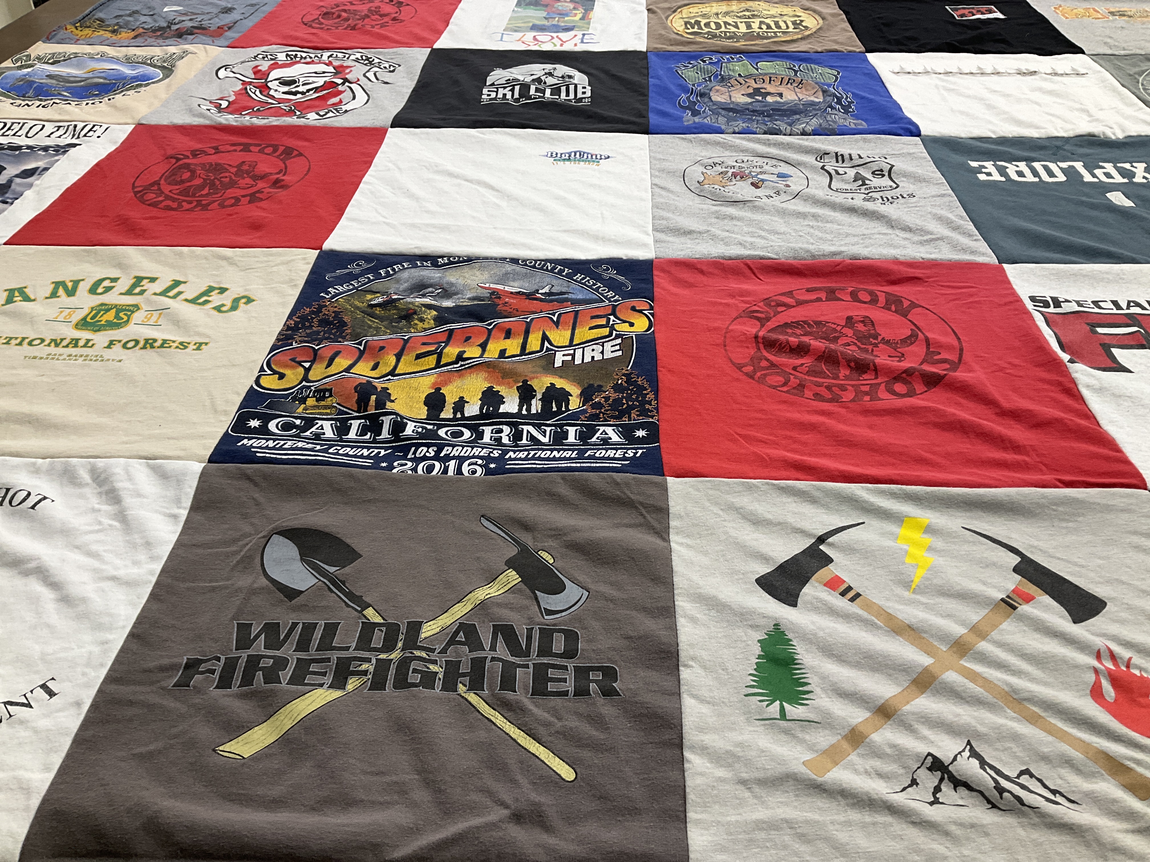 T-shirt quilt with firefighting, outdoors themes by Robert from CA