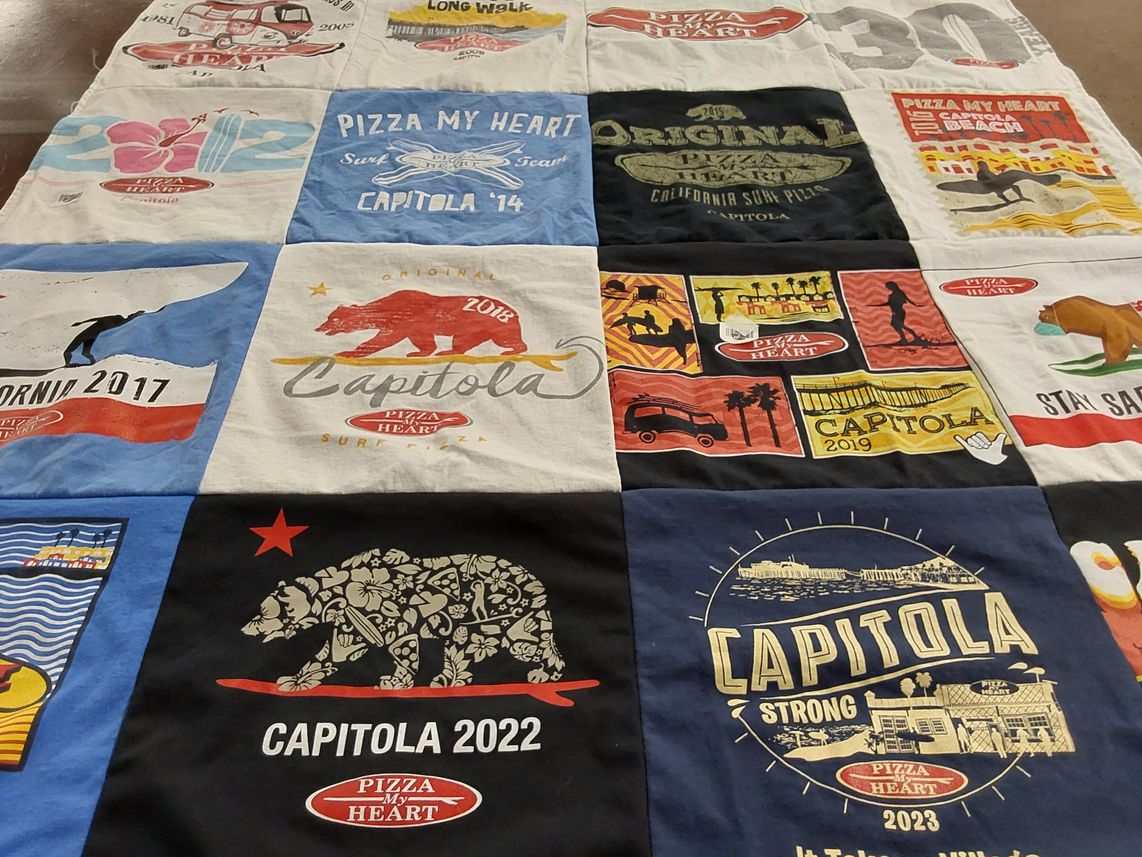 T-shirt quilt with surfing, pizza themes by Christie from CA