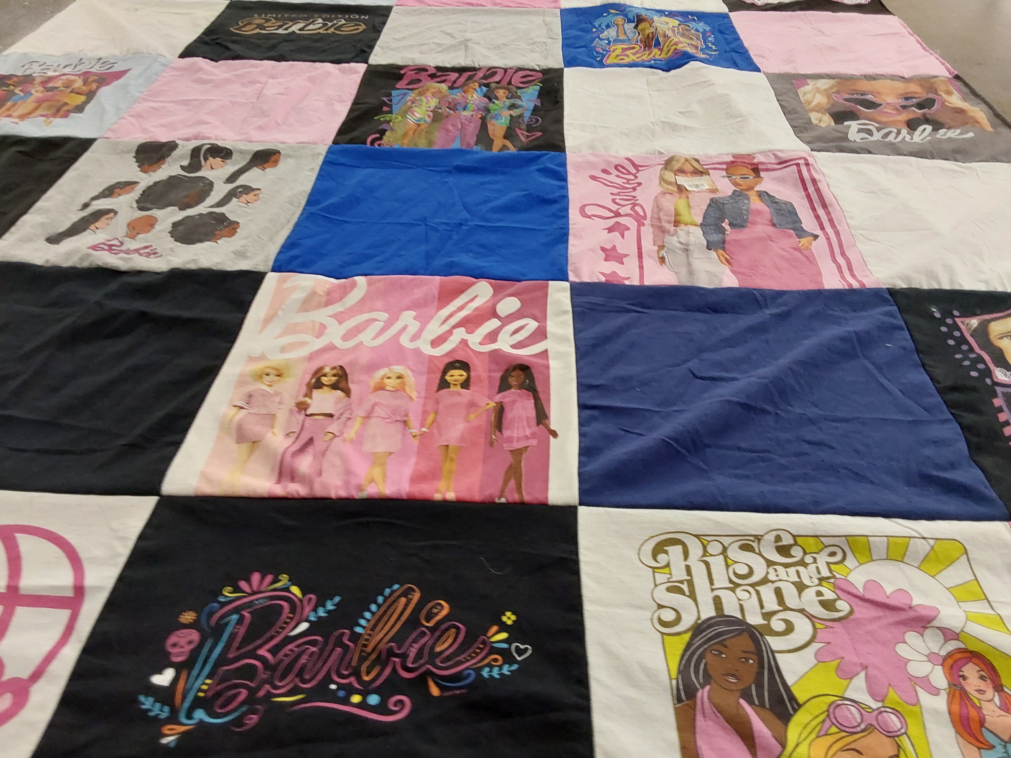 T-shirt quilt with fashion, toys themes by Karen from PA