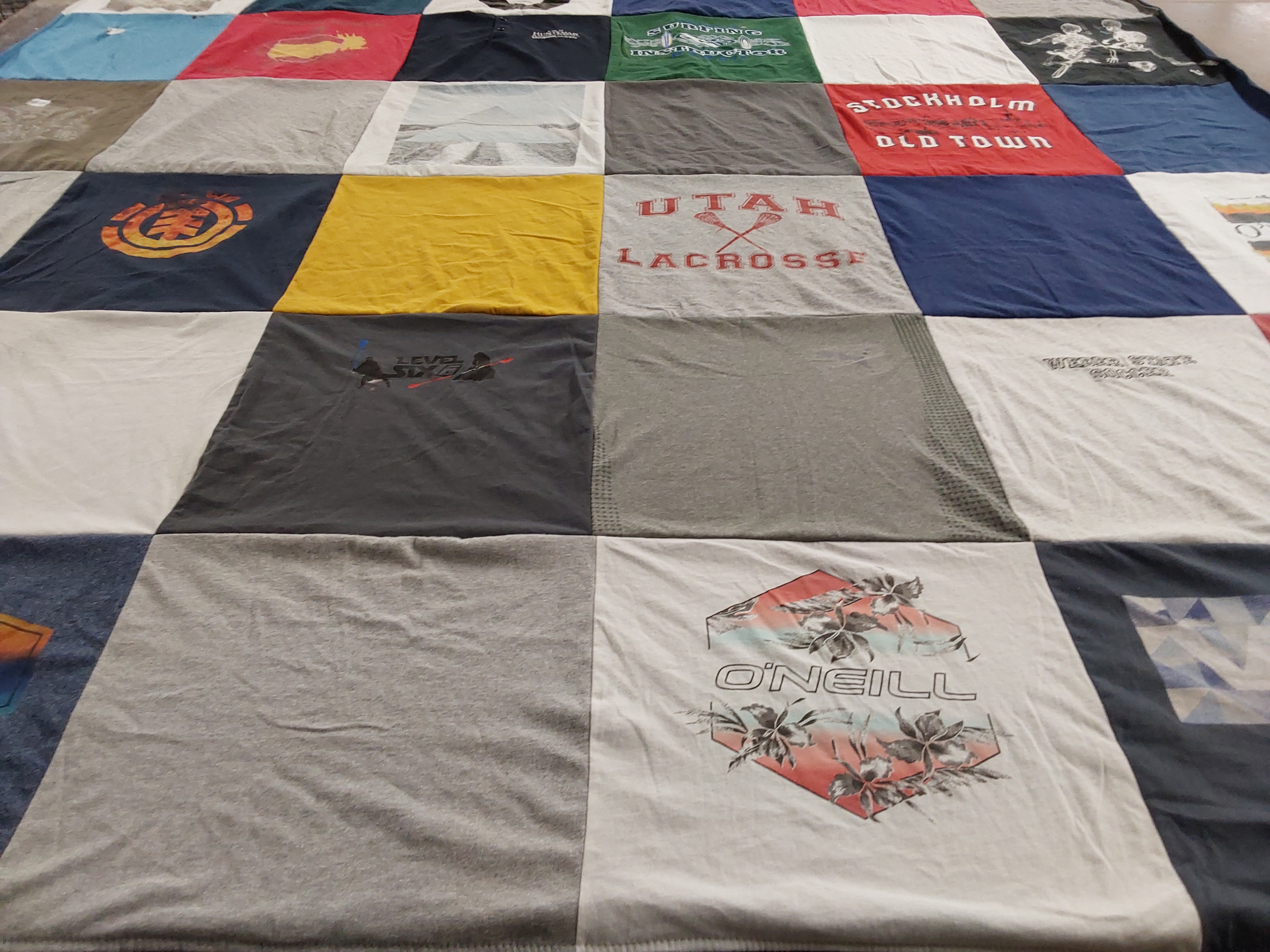 T-shirt quilt with sports, outdoor activities themes by Kirsten from UT