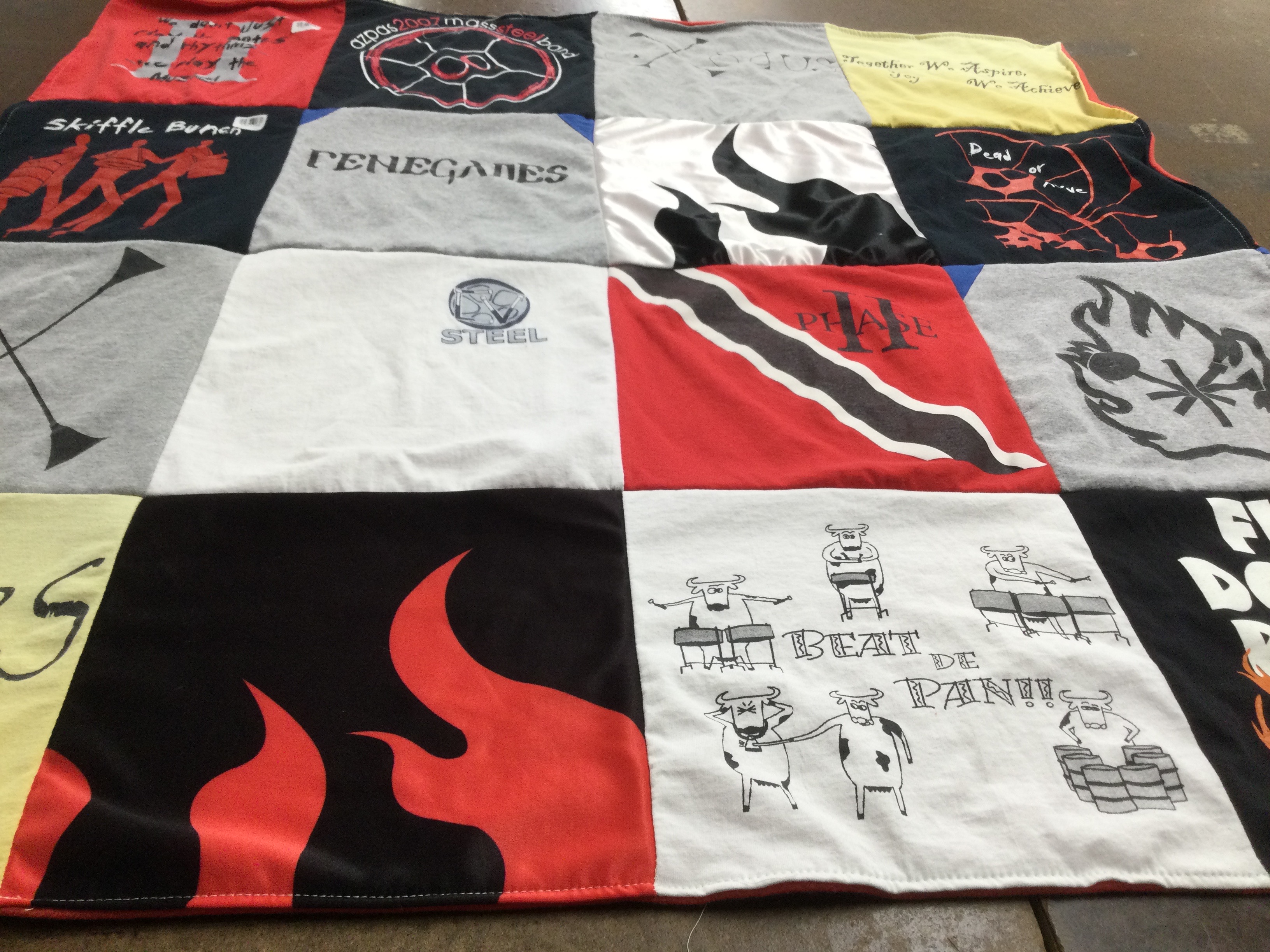 T-shirt quilt with music, drumming themes by Don from AZ