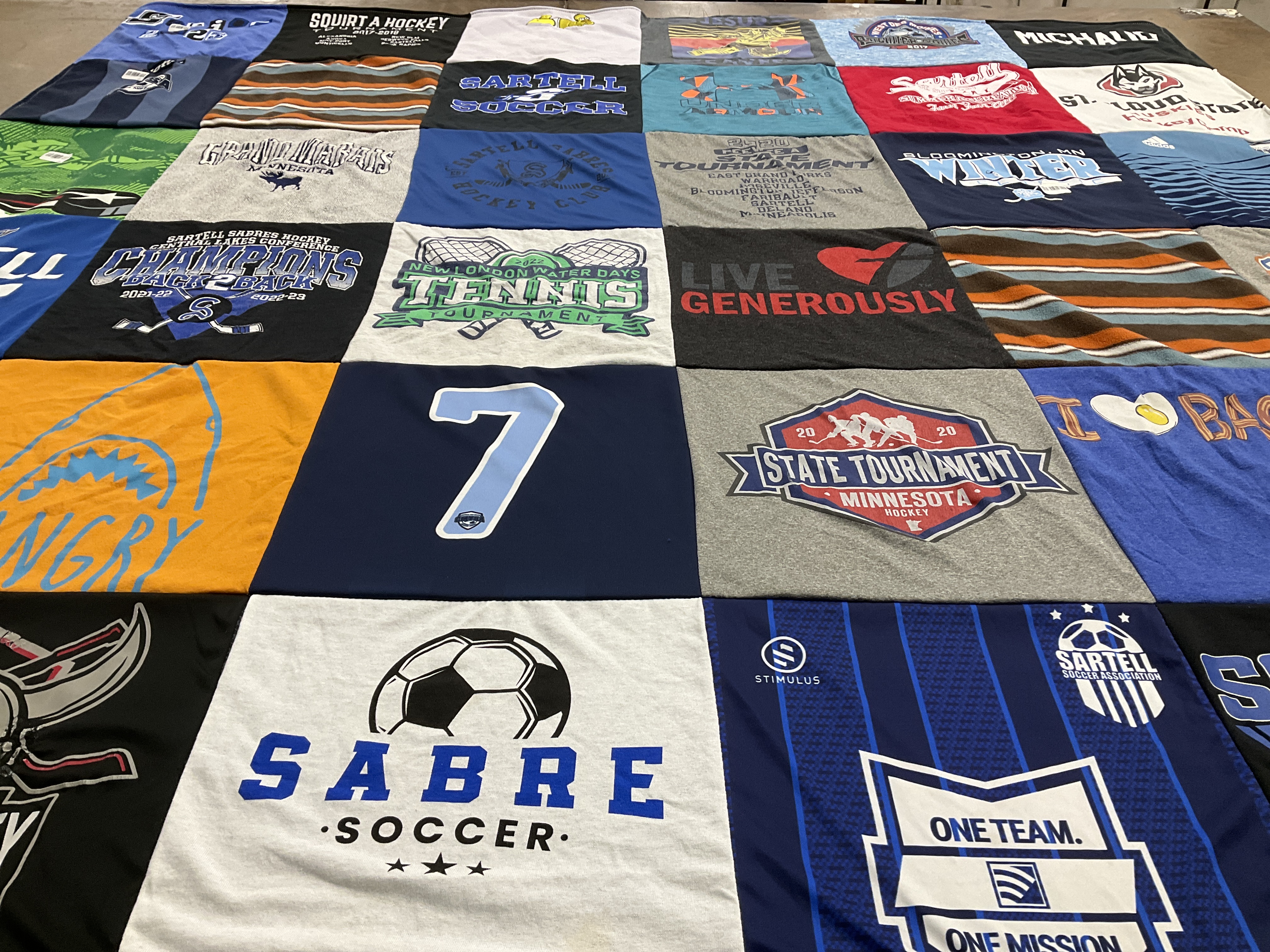 T-shirt quilt featuring sartell soccer team by Dawn from MN