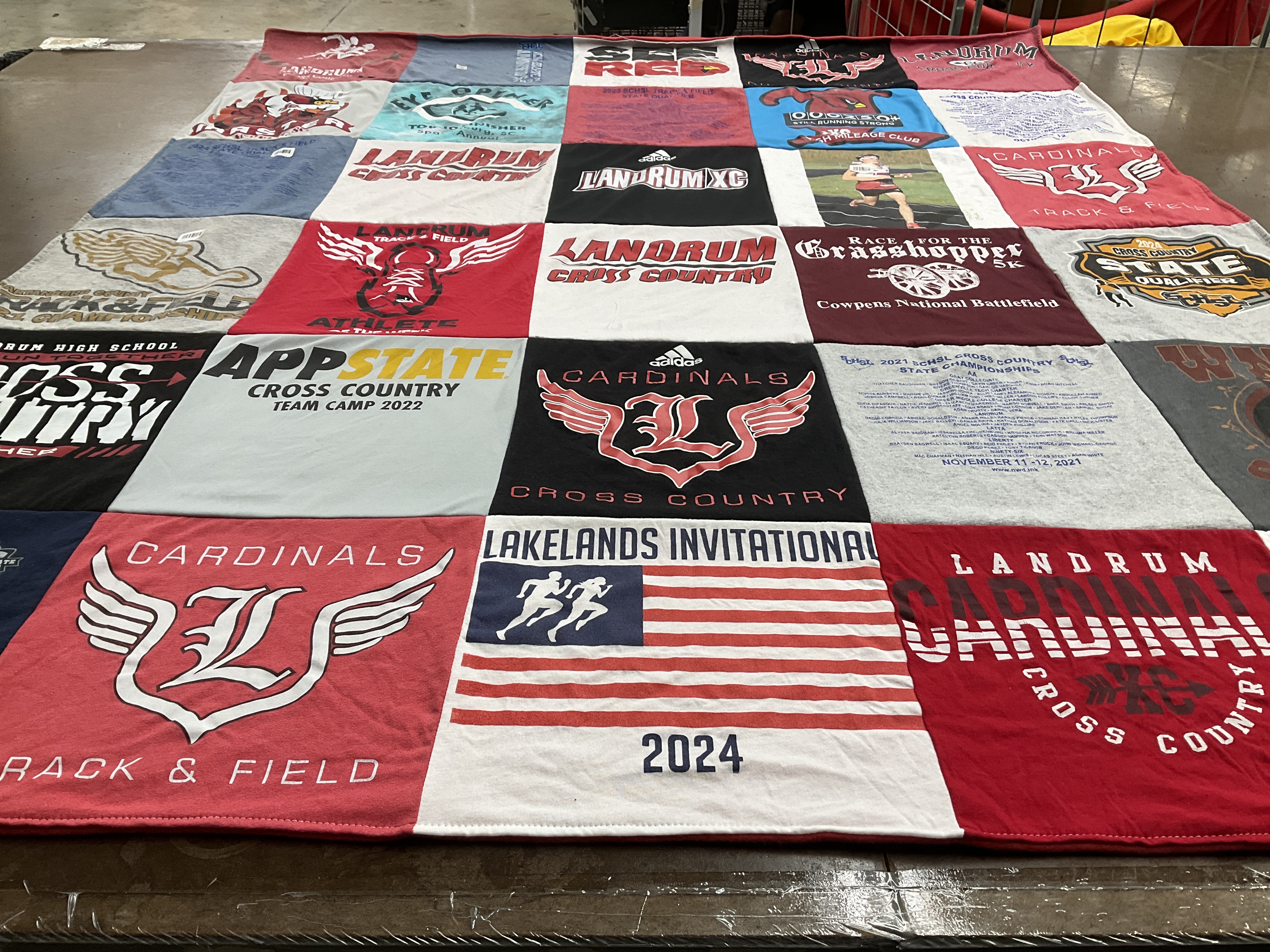 T-shirt quilt featuring cardinals track and field team, landrum cross country team by Jennifer from SC