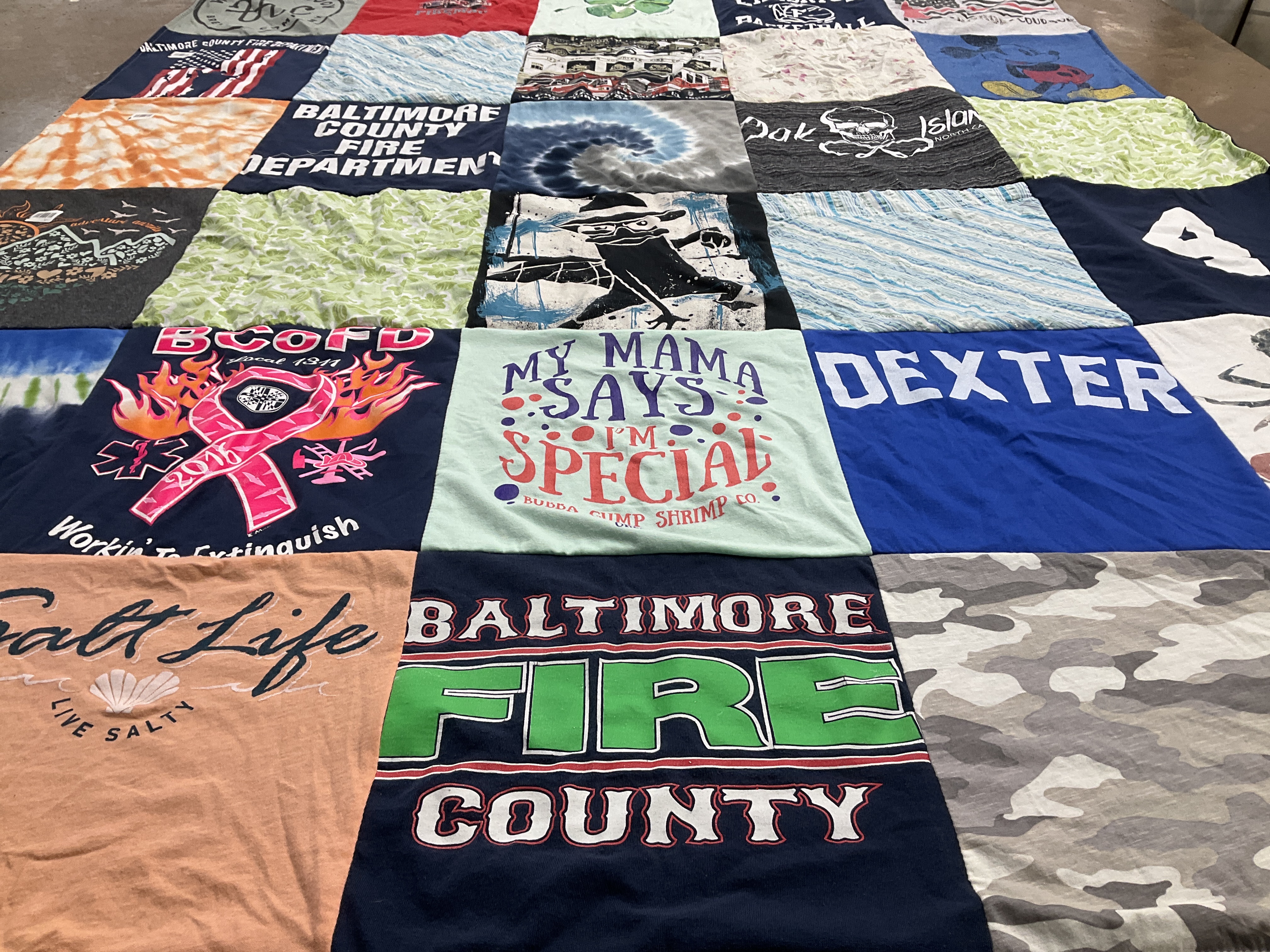 T-shirt quilt with firefighting, community service themes by Mandy from MD