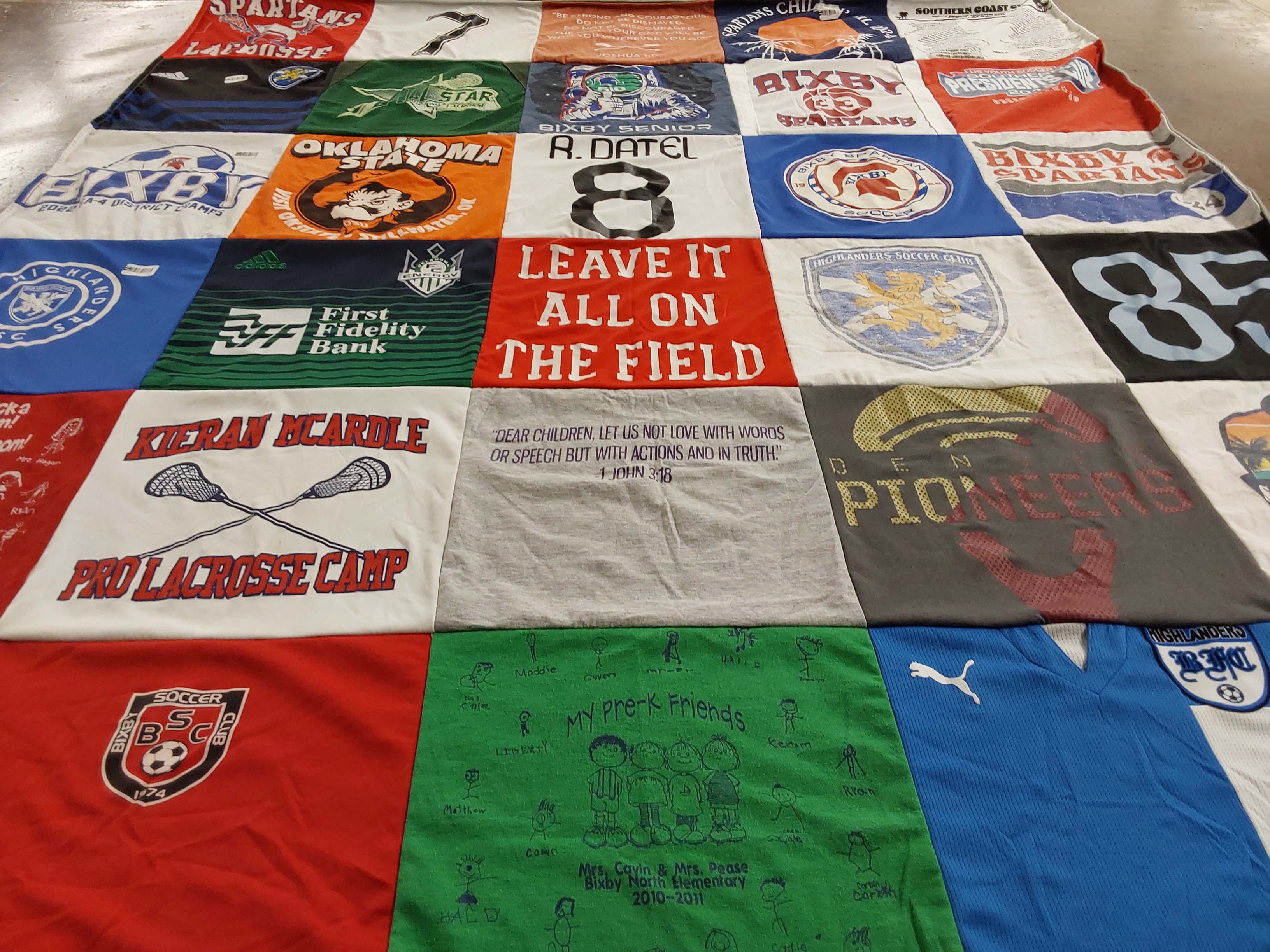 T-shirt quilt featuring bixby spartan lacrosse team, highlander soccer club by Julie from OK
