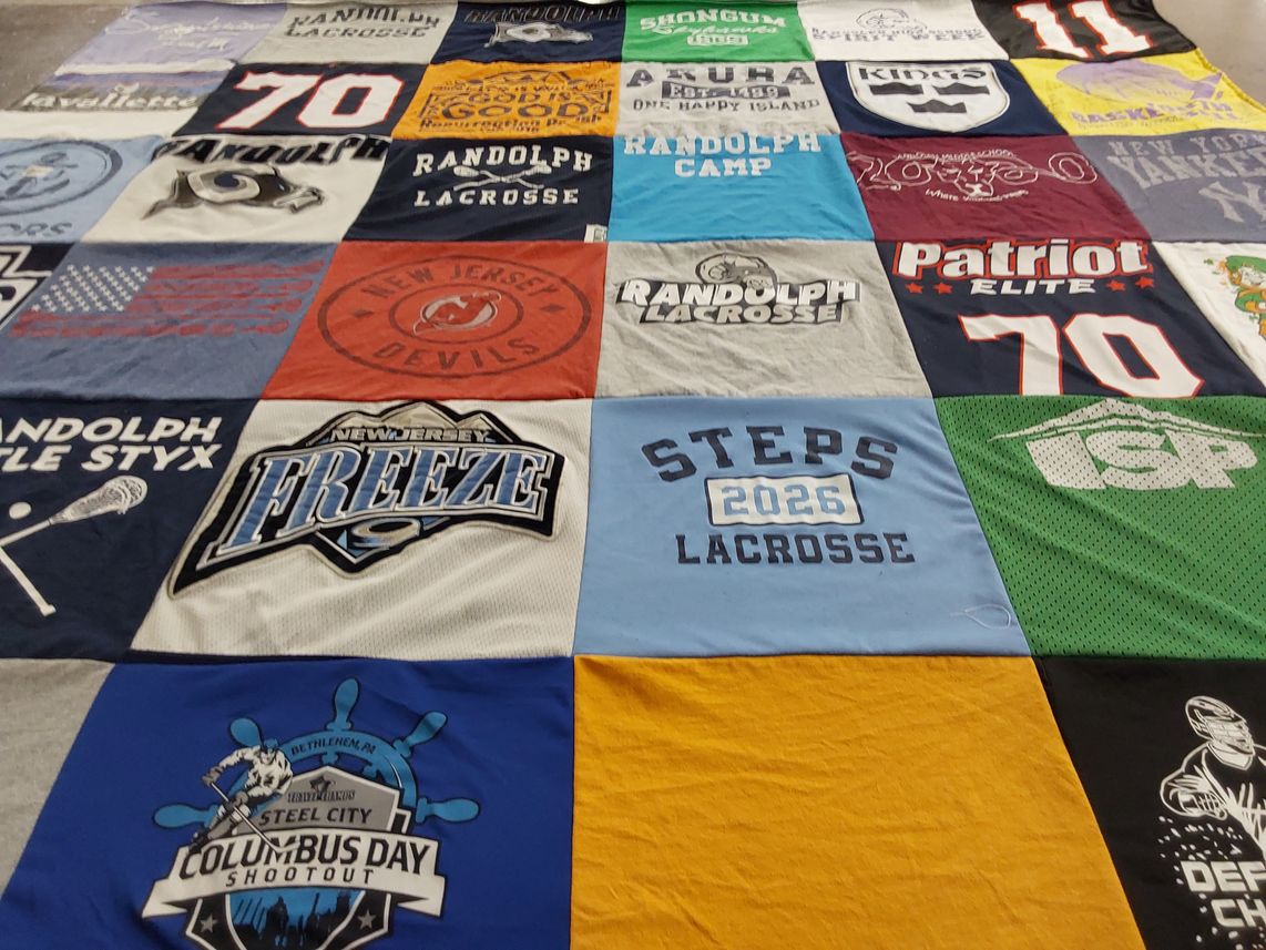 T-shirt quilt with lacrosse, sports themes by Dana from NJ