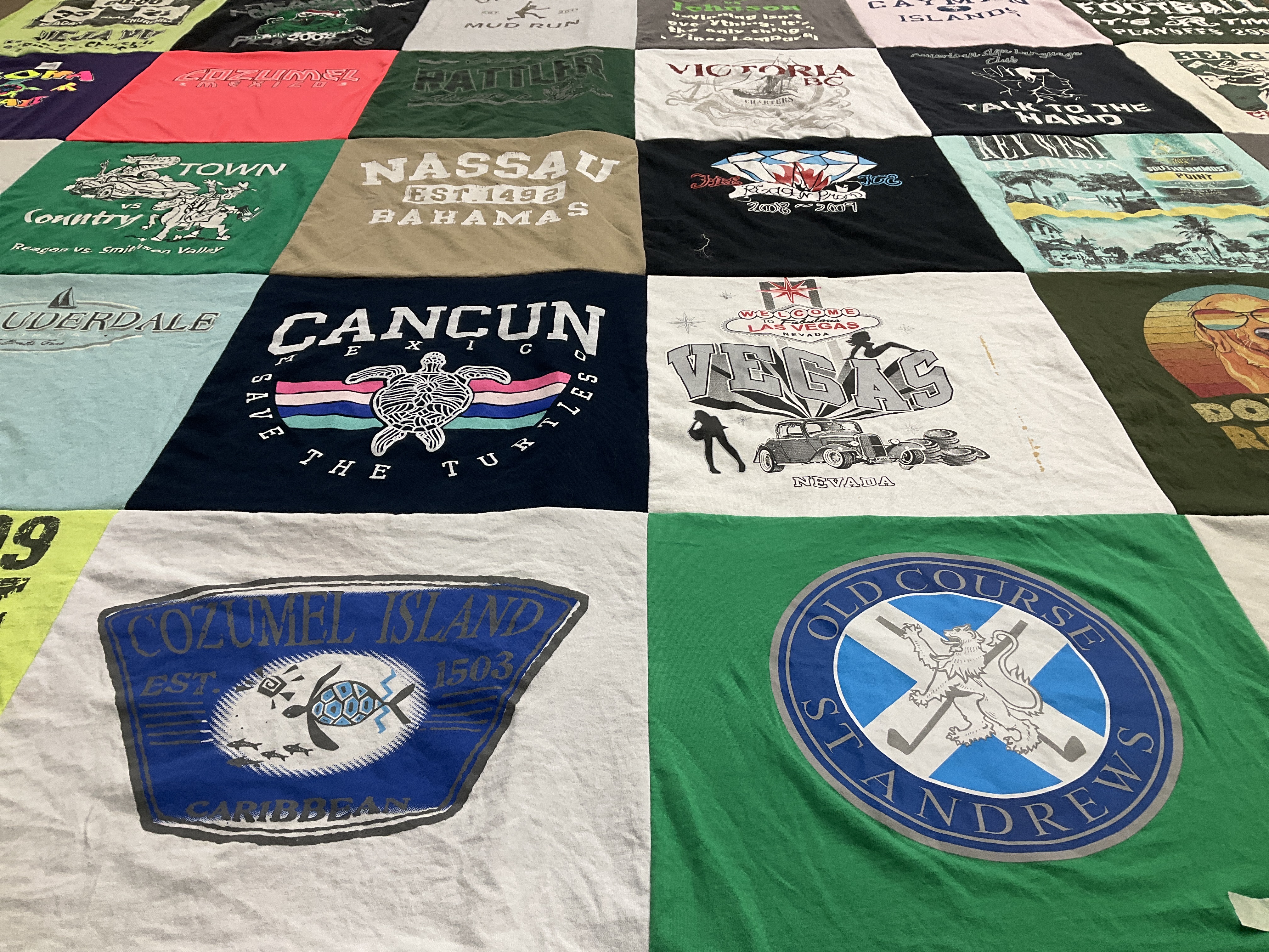 T-shirt quilt with travel, beaches themes by Kassidy from FL
